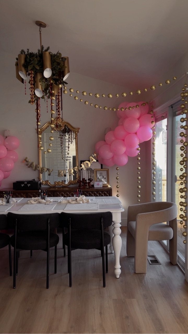 This party? $5 for decor. $20ish for crafts. Homemade cupcakes. Yet it was perfect in all the ways that matter. 💕

Beautiful celebrations don’t have to cost a fortune. You just need a little creativity and intention. 

Sharing my tips below:

1️⃣ Low-cost, high-impact decor:
I grabbed 60 balloons for $3.75 and a gold foil birthday banner for $1.25 at @dollartree. Total new decor: $5! 🎈

2️⃣ Shop your own home:
Sometimes the perfect party touch is stashed away in your seasonal decor boxes. I remembered some Christmas garlands tucked away, and (hello!) they were perfect. ✨

3️⃣ Hands-on crafting makes for memories AND souvenirs:
A 12-pack of canvas totes + fabric markers = $20 for hours of fun AND a sweet birthday keepsake. 🎁

4️⃣ Cupcakes made with love: 
The girls wanted to bake their own! Not only did we use far better ingredients than store-bought, but we also made the sweetest memories eating entirely too much icing. 😅 

💌 Want links to recreate this decor? Comment "PARTY" 💕 

#LTKstorytime #LTKmomlife #LTKHome