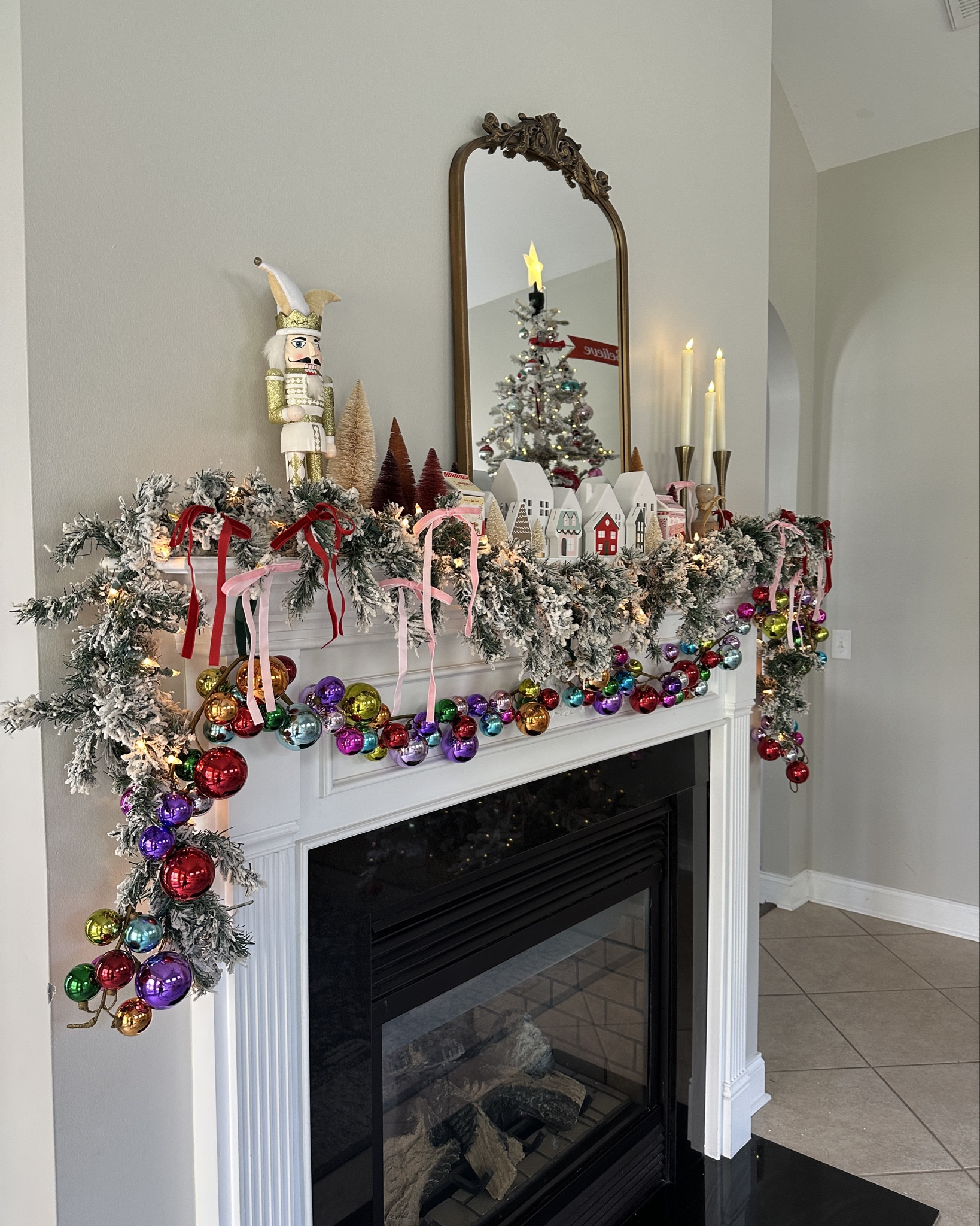 Colorful Christmas mantel styling in our playroom; frosted garland, ribbon accents, rainbow ornaments, bottlebrush trees, nutcrackers, and all the whimsical pieces I used to pull this together. Everything is linked for you.✨🎄
.
.
christmas mantel decor, colorful christmas decor, playroom christmas mantel, frosted garland, christmas fireplace styling, holiday home ideas, whimsical christmas decorations, bottlebrush tree decor, nutcracker christmas decor, rainbow ornaments, christmas village houses, festive holiday mantel, christmas decorating inspo, christmas 2025 home decor

⸻

#LTKhome #LTKholiday #LTKdecor #LTKseasonal #christmasdecor #christmasmantel #playroomdecor #holidayhome #fireplacedecor #whimsicalchristmas #colorfulchristmas #christmasinspo #christmas2025


#LTKHoliday #LTKHome #LTKCyberWeek