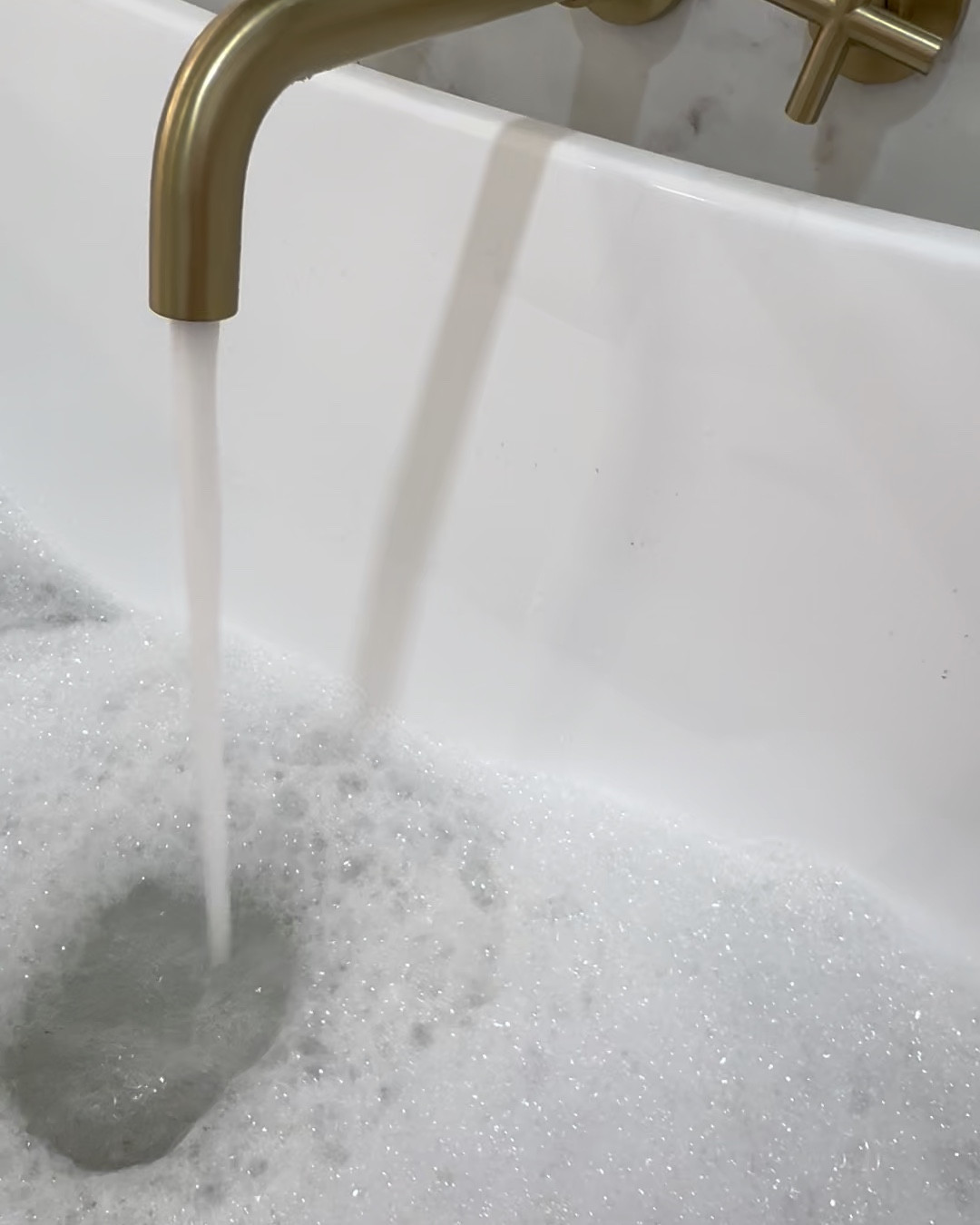 On a chilly day, I’m so thankful for this electric fireplace over my bathtub. I’ll never get over this remodel (swipe all the way to see where we started 😂😂😜)
This fireplace puts of some heat 🔥 (but also has the option to turn off and just burn for looks). 
It comes in a variety of sizes (30”- 68”)
Another great feature we added in this bathroom is the bluetooth speaker exhaust fan. Who doesn’t like to listen to music in the bath or shower? 🥳

#favoriteroom of the house. Bathroom remodel. #thisoldhouse 🥹

#LTKHome #LTKFindsUnder50 #LTKSaleAlert