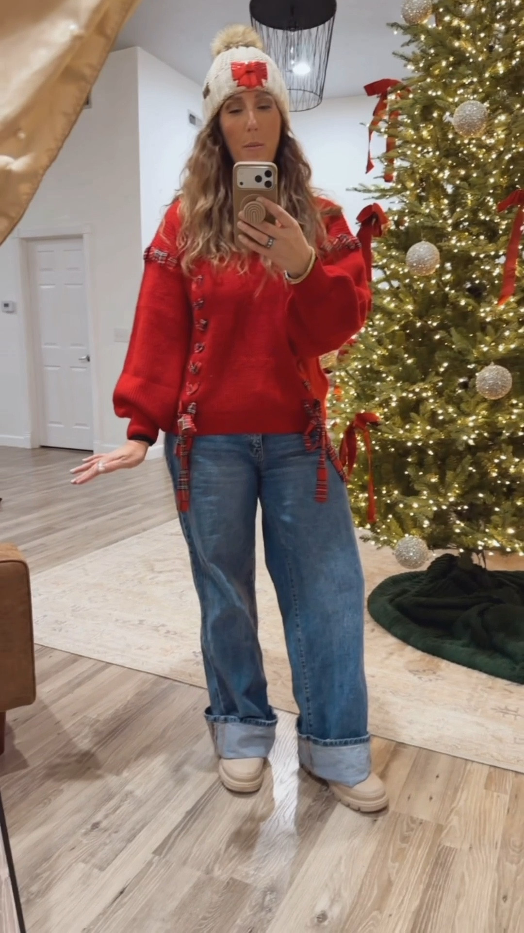 Christmas in NYC Day 3: Christmas Plaid/Red

I like the subtle plaid touch with the ribbons on this sweater. I only took one pair of jeans to save space so they were worn for 3 days. They’re roomy enough that when I was cold (or needed more space in my life on the way home 😬) I could wear leggings under them for added warmth. 
My size in the sweater was sold out, so I sized down…but I wish it was longer- tall girl problems!

#LTKHoliday #LTKTall #LTKootd