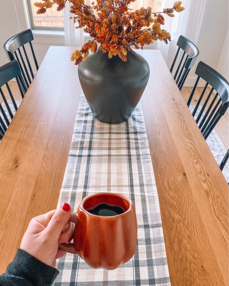 October 1 means time for the pumpkin mugs and fall centerpieces! #diningroom #falldecor #floralarrangement #fauxfloral 

#LTKHalloween #LTKSeasonal #LTKhome