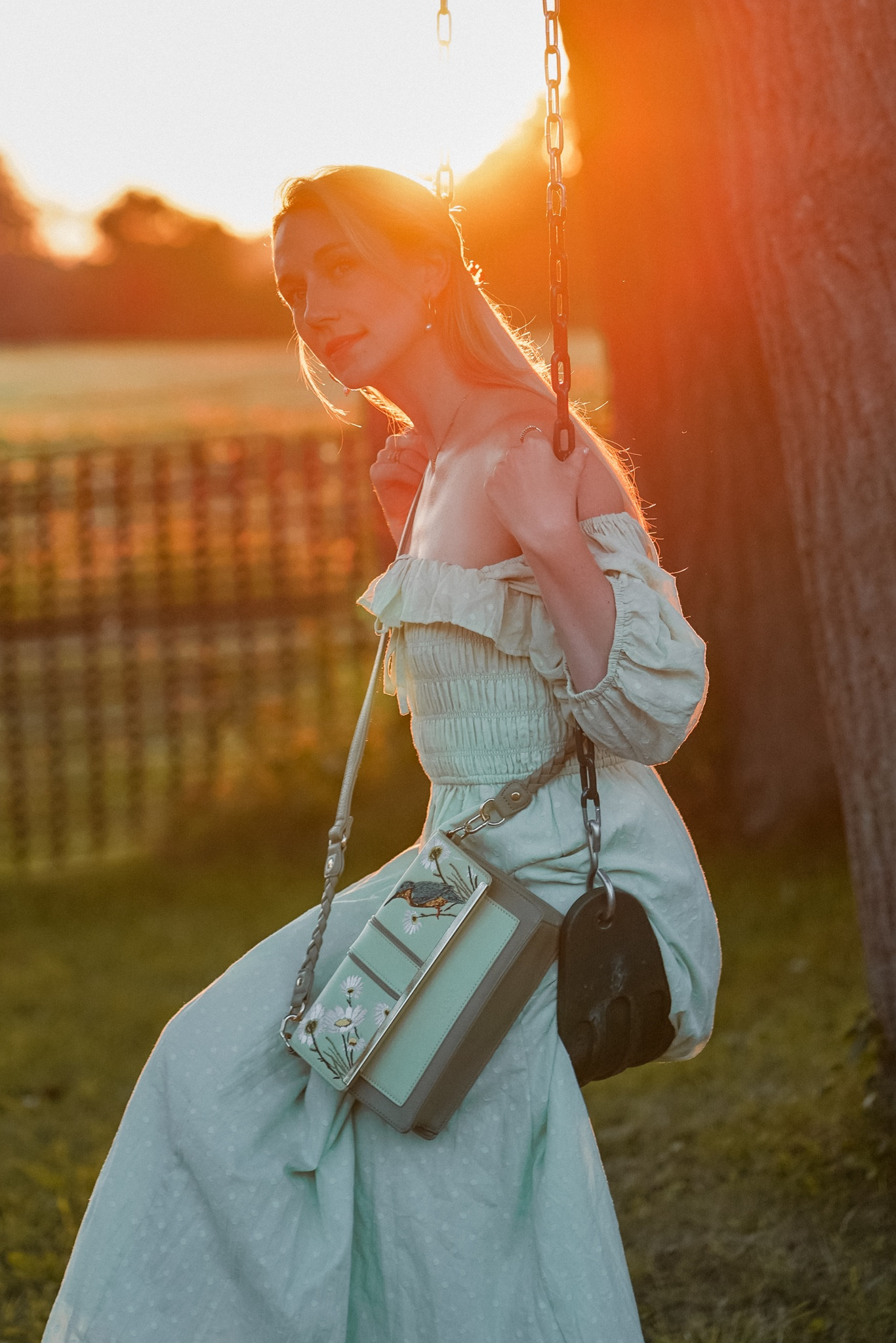 This elegant tonal green cross-body bag features an embroidery of the elusive kingfisher sitting amongst the wildflowers 🌿 Crafted with love from recycled materials and features plaited detailing on the strap and gold-toned hardware. Designed for the free-spirited: the kingfisher is symbolic of freedom, courage, adventure, and balance. 

#LTKitbag #LTKunder100