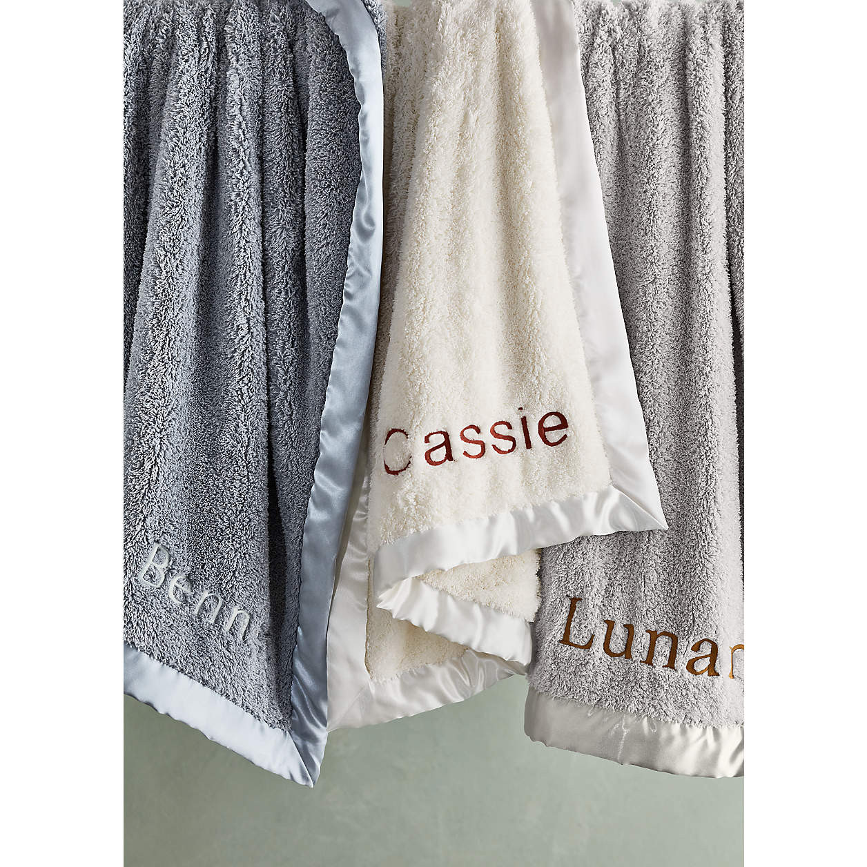 Cream Satin Trim Plush Baby Stroller Blanket + Reviews | Crate & Kids | Crate & Barrel