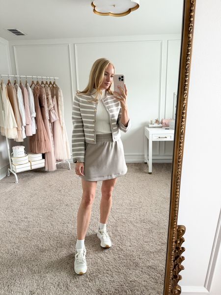 Abercrombie sale! Love this cute and casual look for spring. I’ve paired this comfy knit skirt with a white tee and striped sweater jacket. I finished off the look with my favorite sneakers. 

#LTKSpringSale #LTKstyletip #LTKtravel