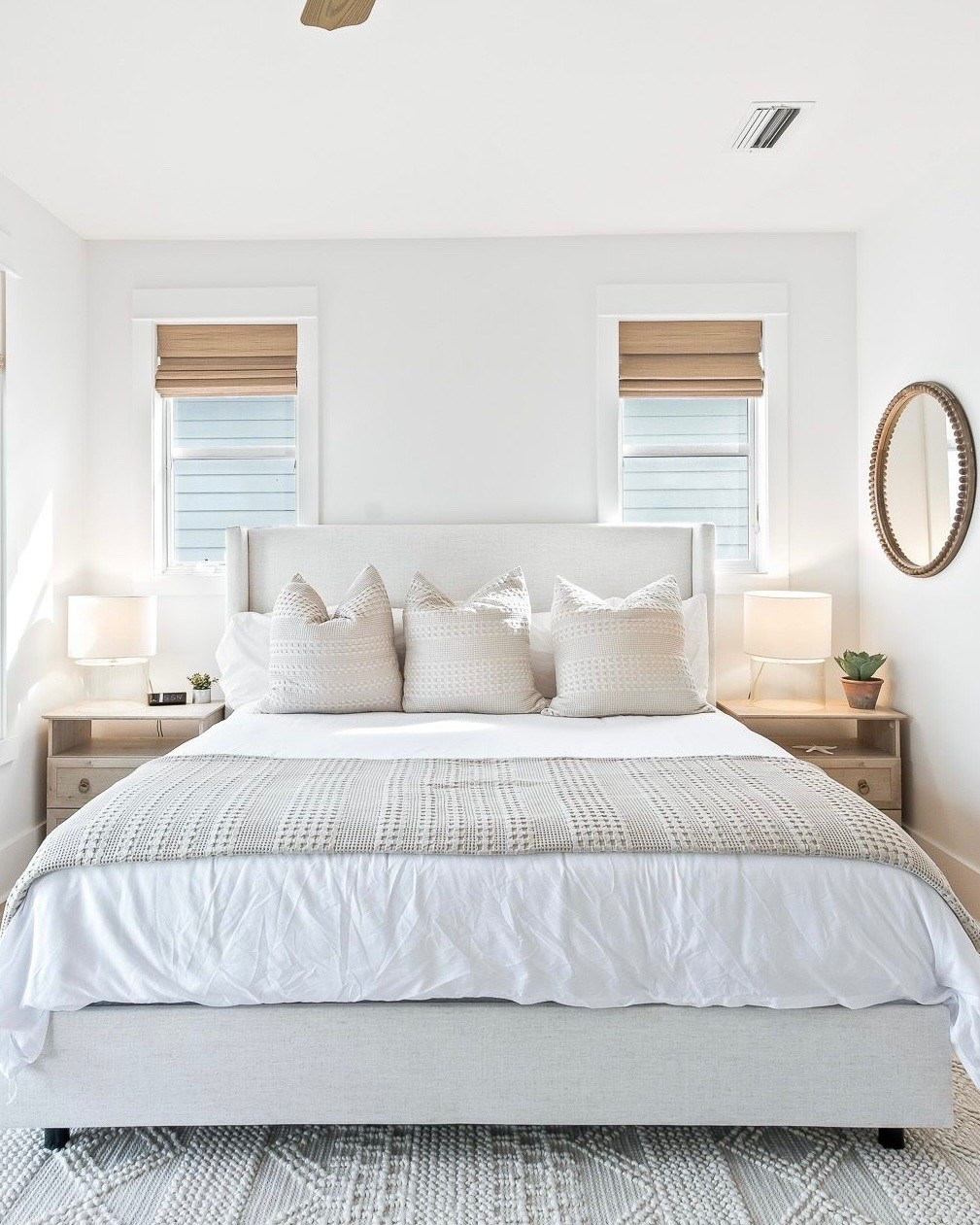 These nightstand are on sale for just over $100 each. I changed the hardware to make them look a little more elevated.  The bed is the color talc.  Shades are capri ivory.
