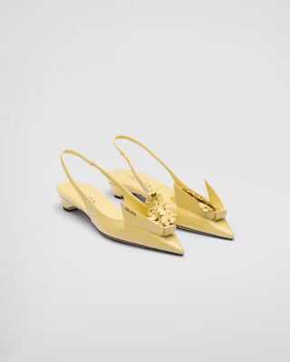 Brushed leather slingback pumps with floral appliques | Prada Spa US