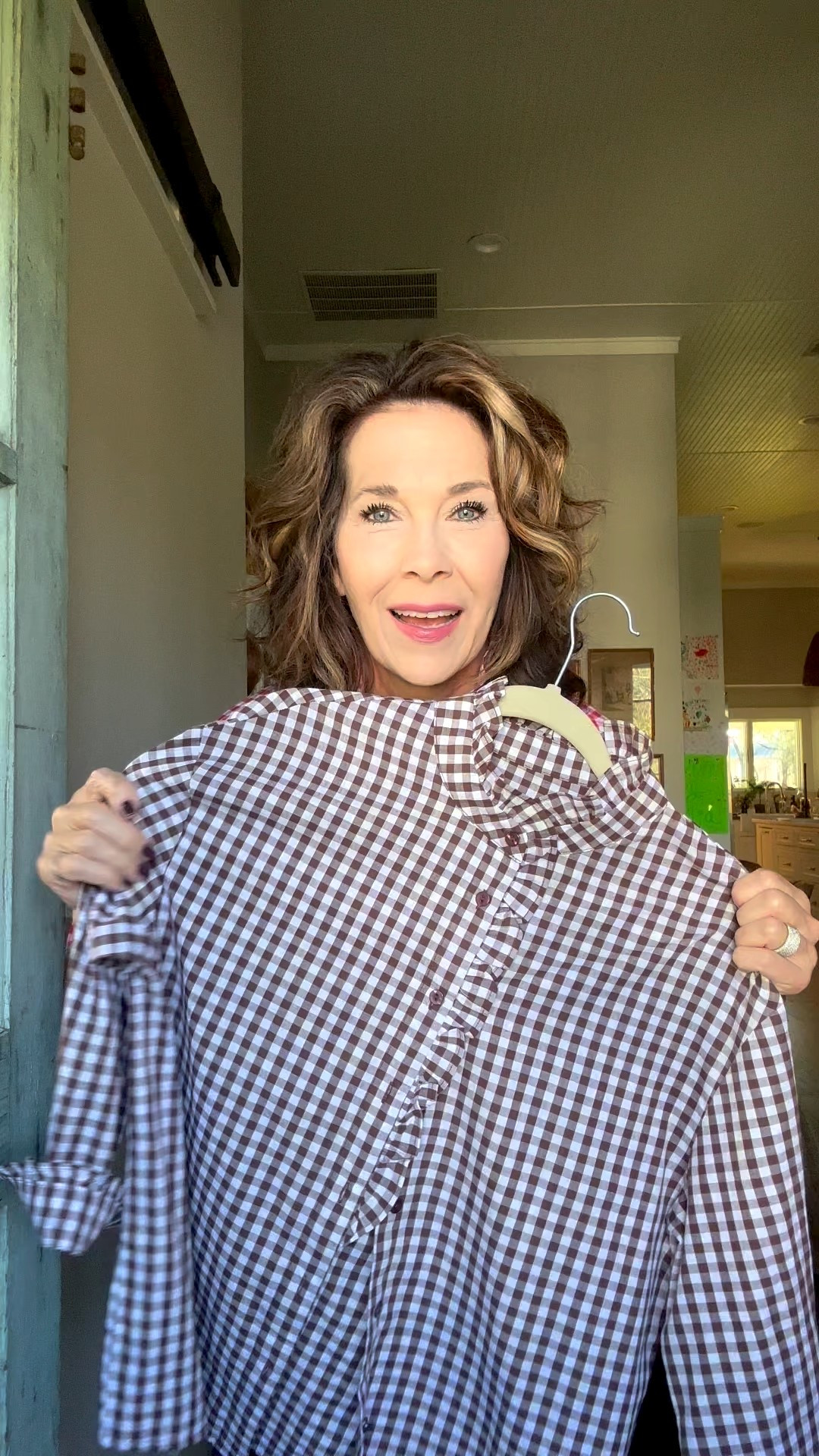 I bought this cute ruffle trim shirt a couple of weeks ago and love it!

I bought the brown gingham check and have worn it several times already. 

I decide to grab the red and white gingham check to wear during the holidays while it is on the Black Friday sale.

This cute shirt is less that $20 right now during the sale and comes in lots of colors. 


#LTKFindsUnder50 #LTKHoliday #LTKOver40