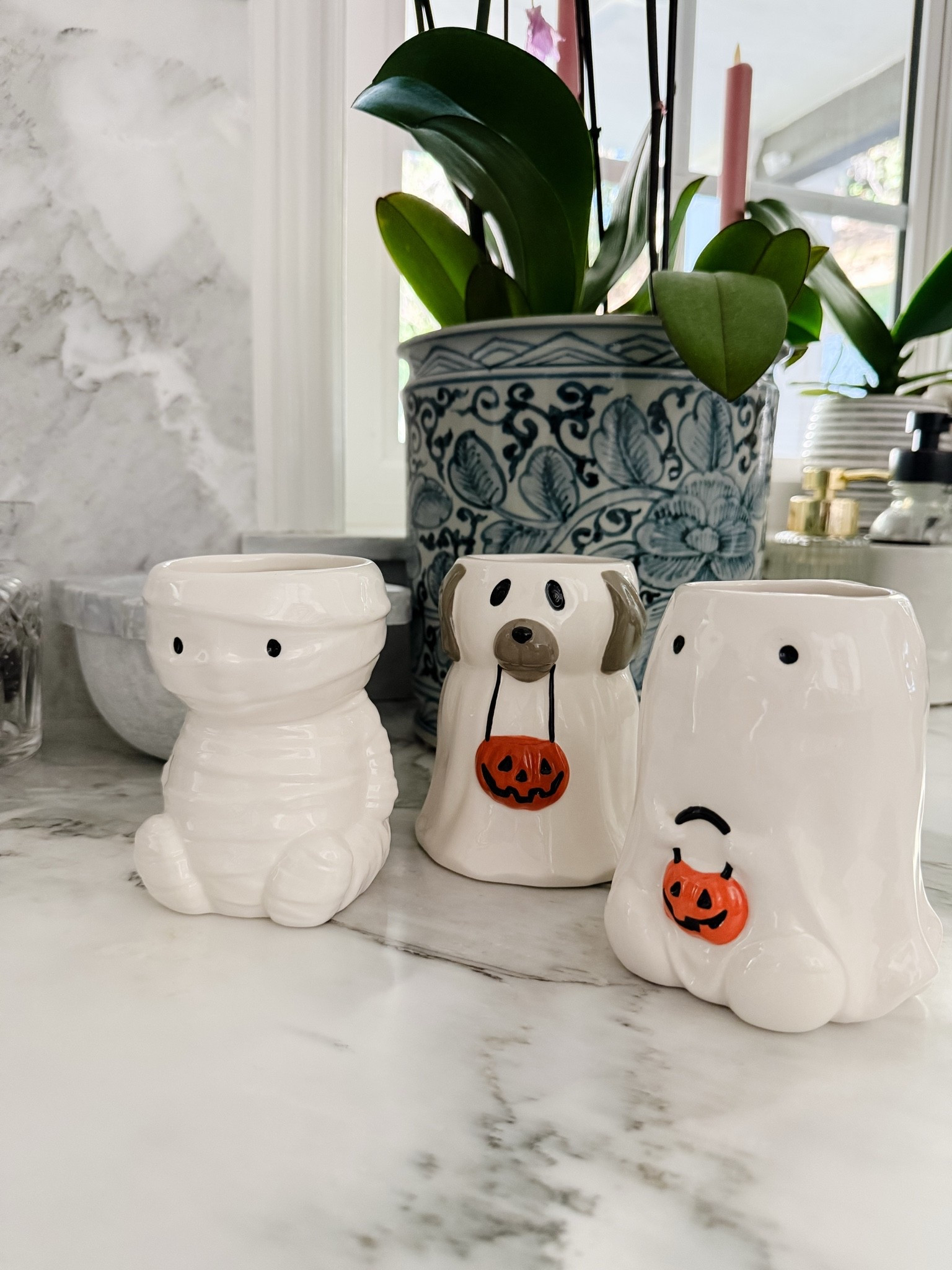 When Halloween decor is just plain ole cute! Love these mugs!