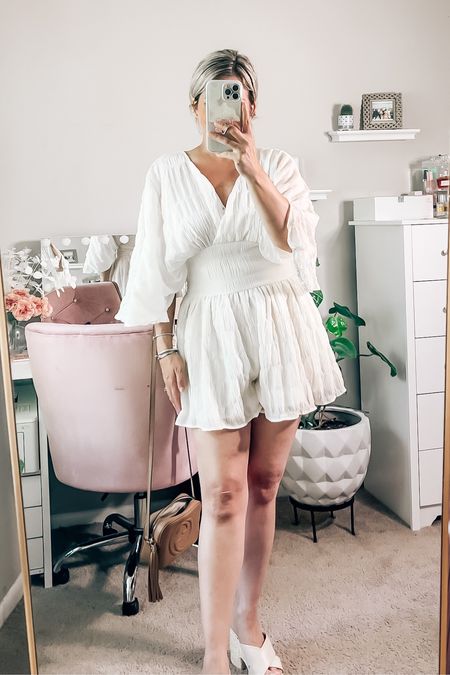 White flutter sleeve romper from Vici. Perfect for vacation. Adorable tie back.

Use my code ‘KATHERINEMARIE.SHOPS’ for a discount on your order.

#LTKunder50 #LTKstyletip #LTKsalealert