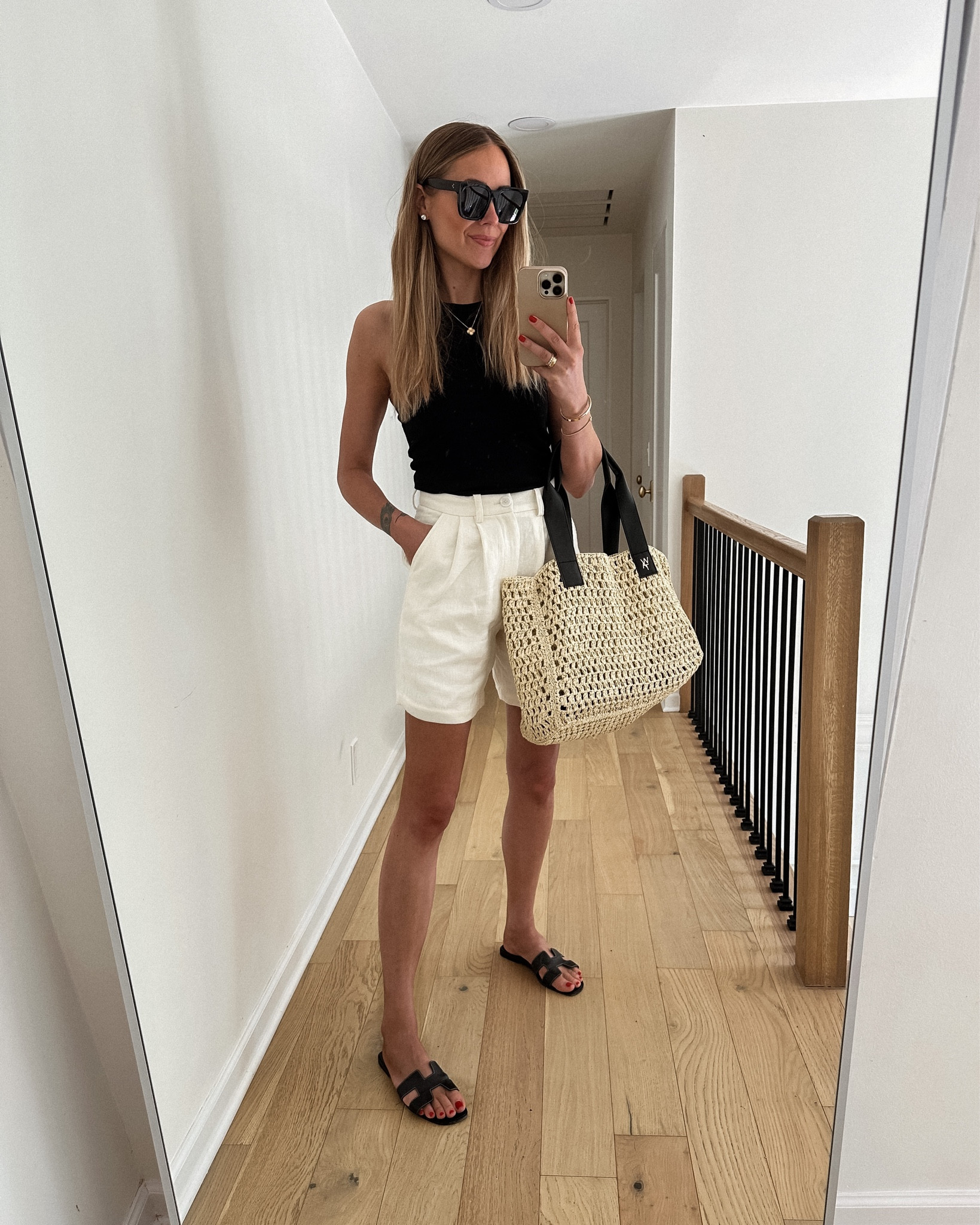 Fashion Jackson, summer outfit, white shorts, black tank, straw tote, spring capsule, Hermes sandals #fashionjackson #shorts #capsule #sandals

#LTKstyletip #LTKshoecrush #LTKunder100
