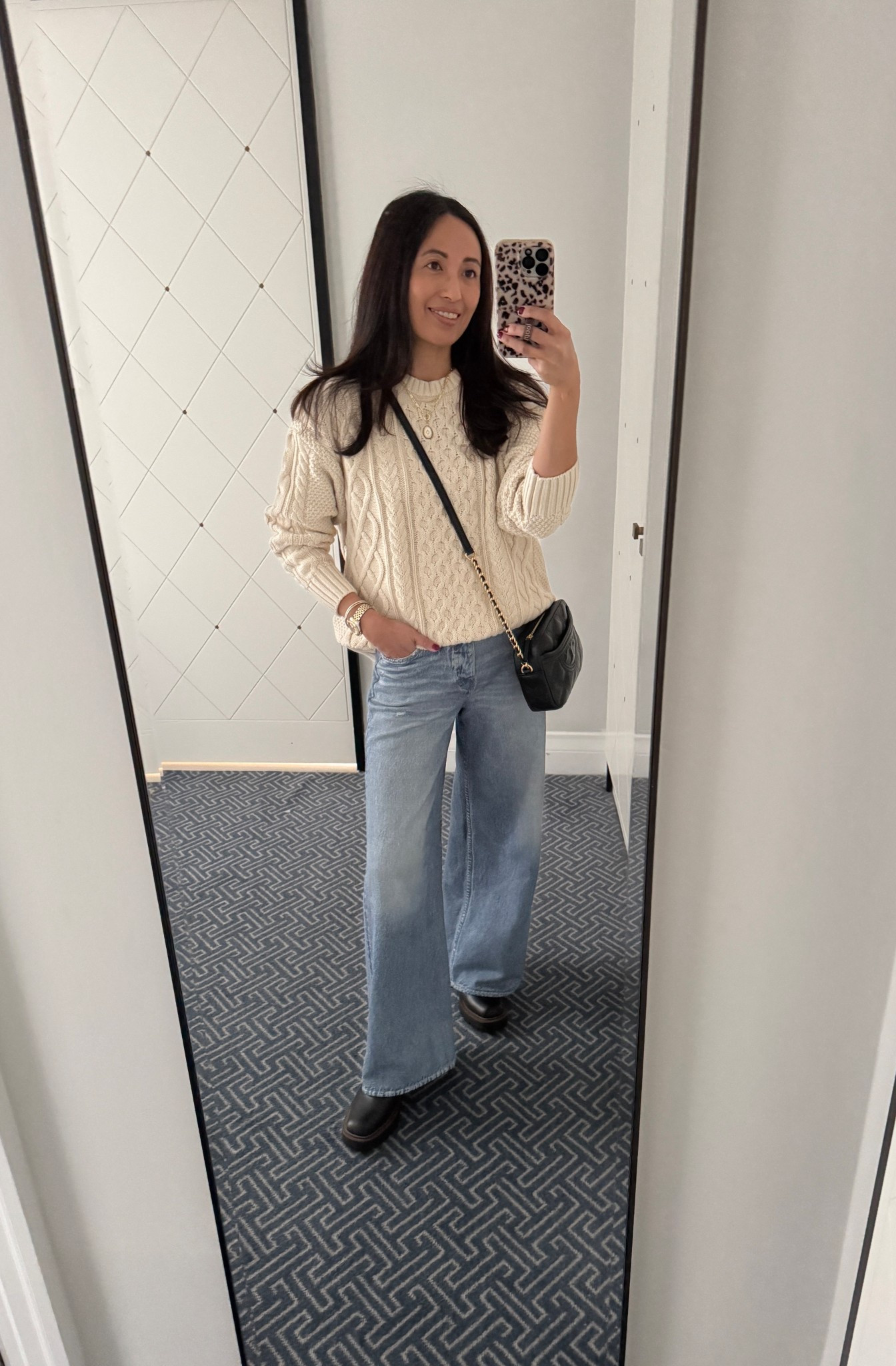 Winter outfit for sightseeing in London. 
All cotton cable knit sweater. Nice oversized fit. True to size. 
Sweatpant jeans. Linking designer and save options. 
Chelsea boots are leather and waterproof. 
New charm for my necklace. 


#LTKOver40 #LTKFindsUnder100 #LTKTravel