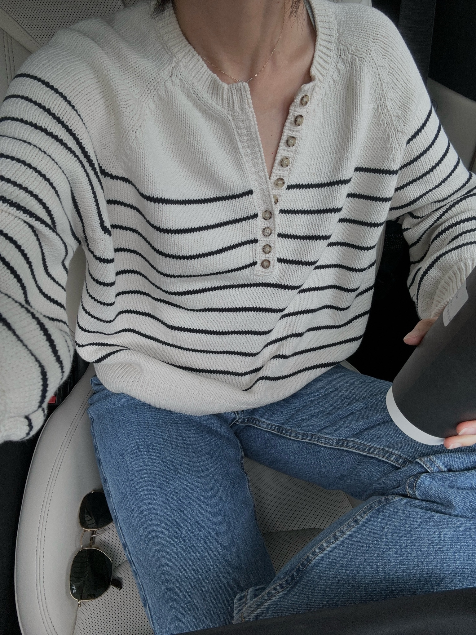 Sweater: Leotine. In a xs 
Jeans: Everlane 