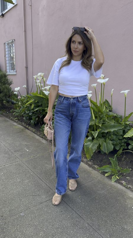 Casual spring outfit
I love the fit of these Levi’s jeans under $100. Perfect length and I’m 5’1  This white top came with shoulder pads, but they were easily removed and I think it looks so much better!

Levi’s 90s jeans- 25
Revolve white tshirt- small
Mango mesh ballet flats- tts
Bottega Veneta sunglasses
Dior D Joy micro bag

Spring outfit, jeans, summer outfit, sandals, mesh flats, ballet flats, white t shirt, petite

#LTKfindsunder100 #LTKstyletip #LTKVideo