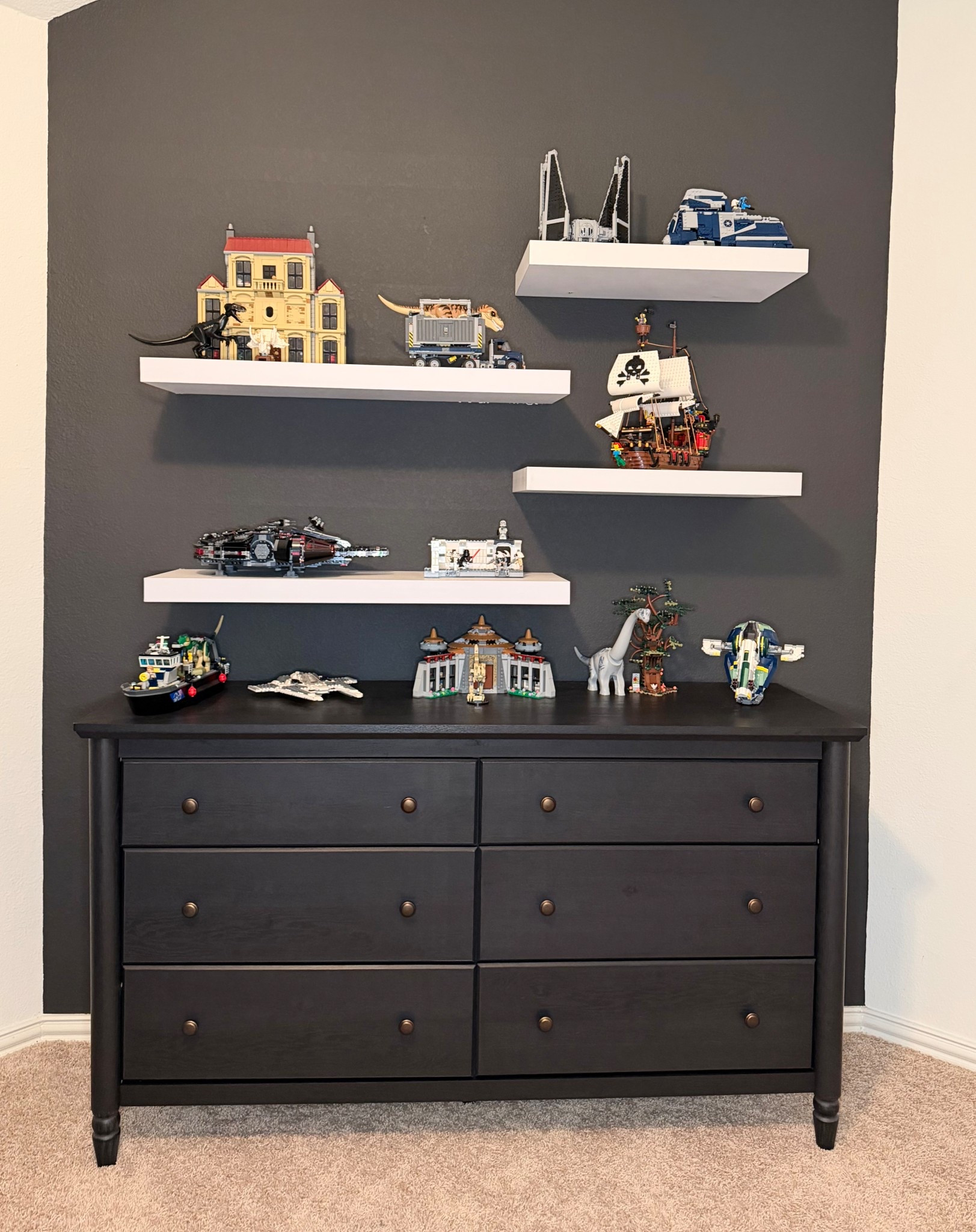 I have been procrastinating moving these shelves up but in the meantime my son decorated with legos! Its not exactly what I was imagining but it is his room💙

My Texas House Dresser
Bedroom
Furniture
Boys room 

#LTKHome #LTKKids