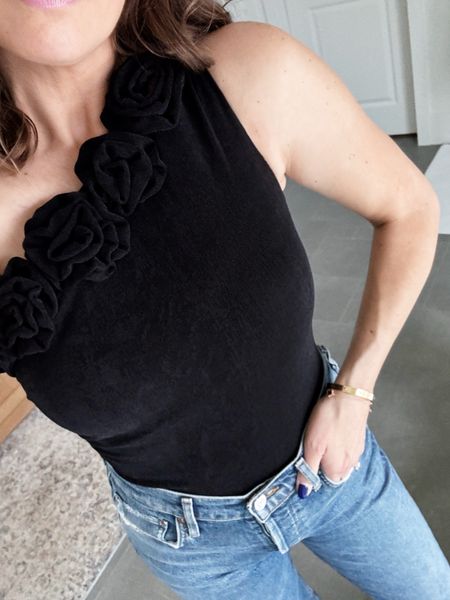 Outfit planning for our trip to Vegas! Love the rosette detail in this bodysuit! Would be great for date night or girls night- runs tts. 

#LTKfindsunder100 #LTKparties #LTKover40