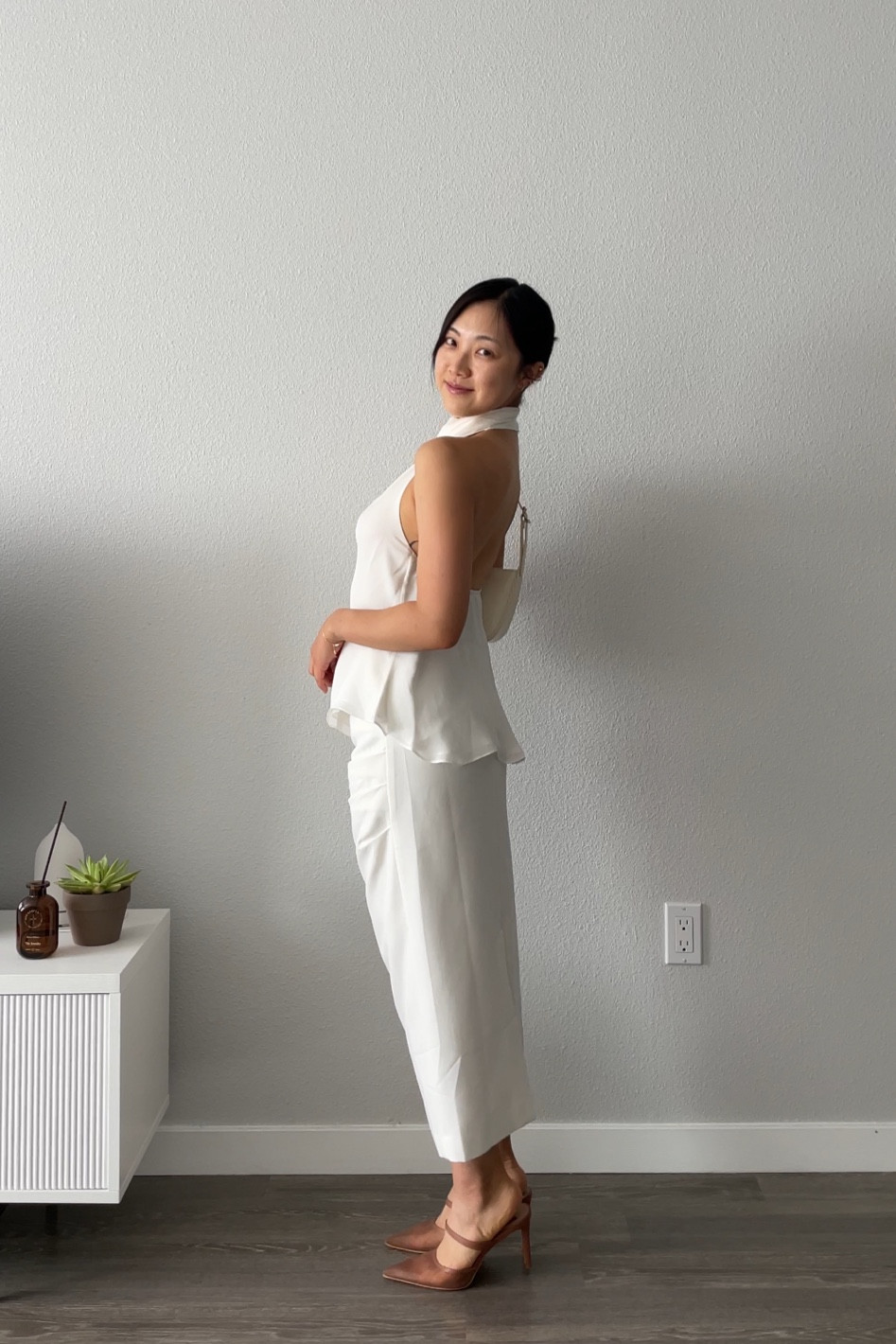 Best backless halter blouse with skirt and heels

#LTKstyletip #LTKsummer #LTKwedding