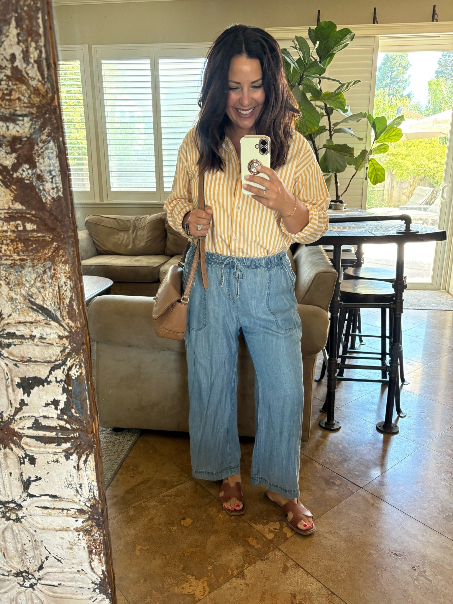 Petite-friendly summer outfit idea!
Wearing a lightweight striped button-down, chambray wide-leg pants, and comfortable brown sandals. This casual summer outfit is perfect for teachers, moms, travel days, and everyday errands.

#LTKmomlife #LTKOver40 #LTKPetite
