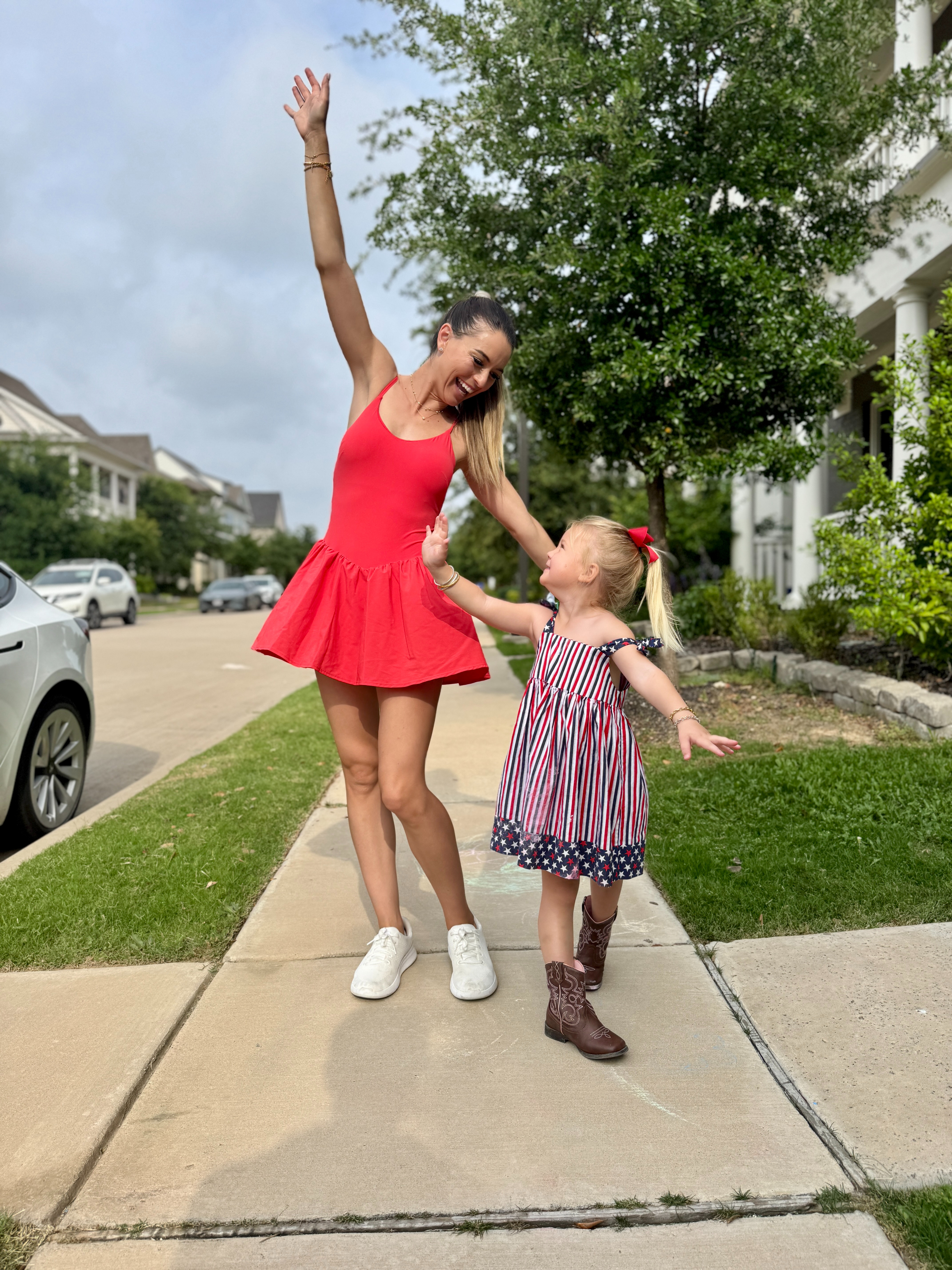 The cutest red athletic dress for summer — perfect for Memorial Day weekend or the 4th of July 🇺🇸☀️ Comfy, sporty, and festive in all the right ways! Linking a similar white activewear dress + the cutest American flag knit sweater from Target, plus similar outfit options for SK’s dress and boots too! ❤️ 

 #LTKActive #LTKStyleTip #LTKKids