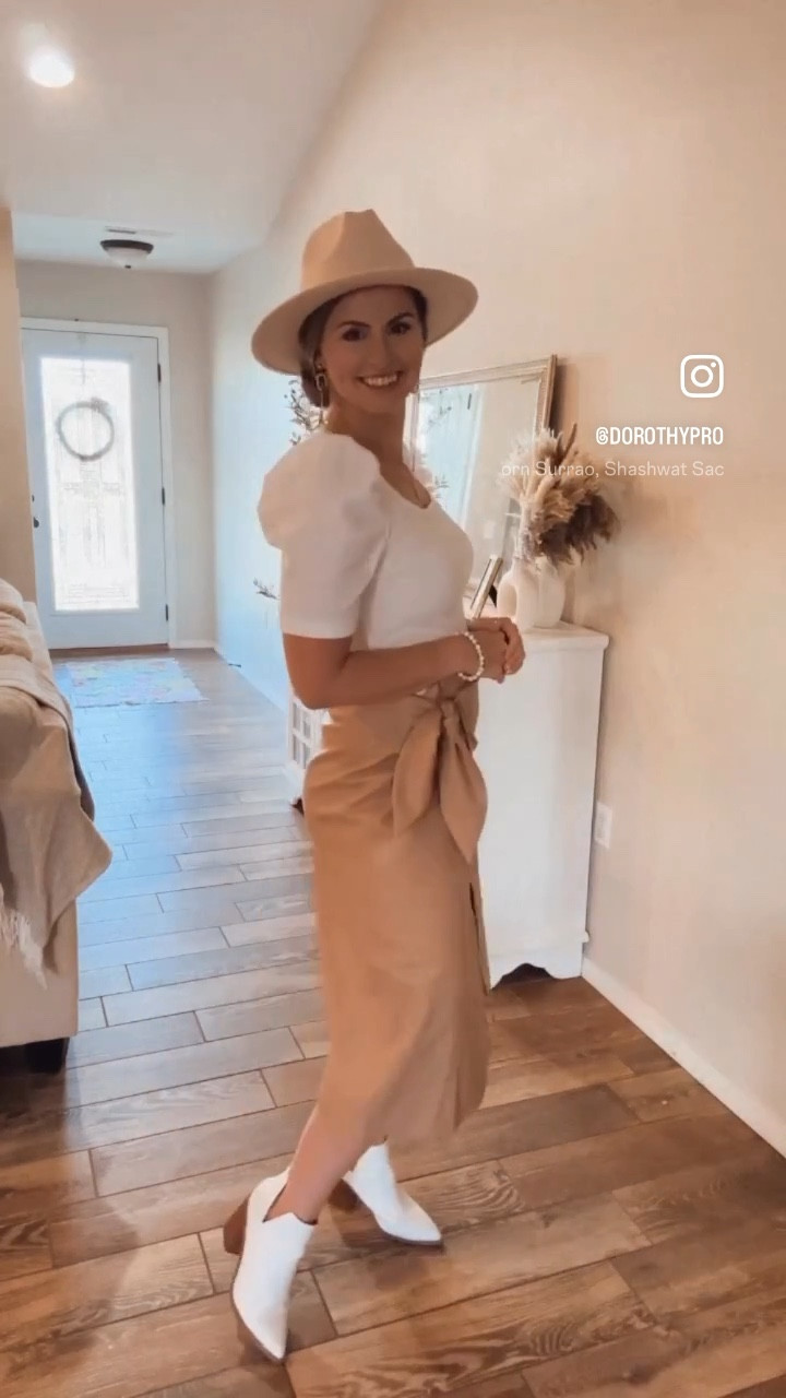 Amazon fashion: What I ordered vs what I got!!! Super impressed with this faux leather skirt that wraps & ties!!! Paired it with my white ankle boots, felt hat, gold necklace and puff sleeve ribbed top! 

Great spring outfit, Valentine’s Day outfit or date night look! Galentines party, church dress, work wear 

#LTKSeasonal #LTKworkwear #LTKVideo