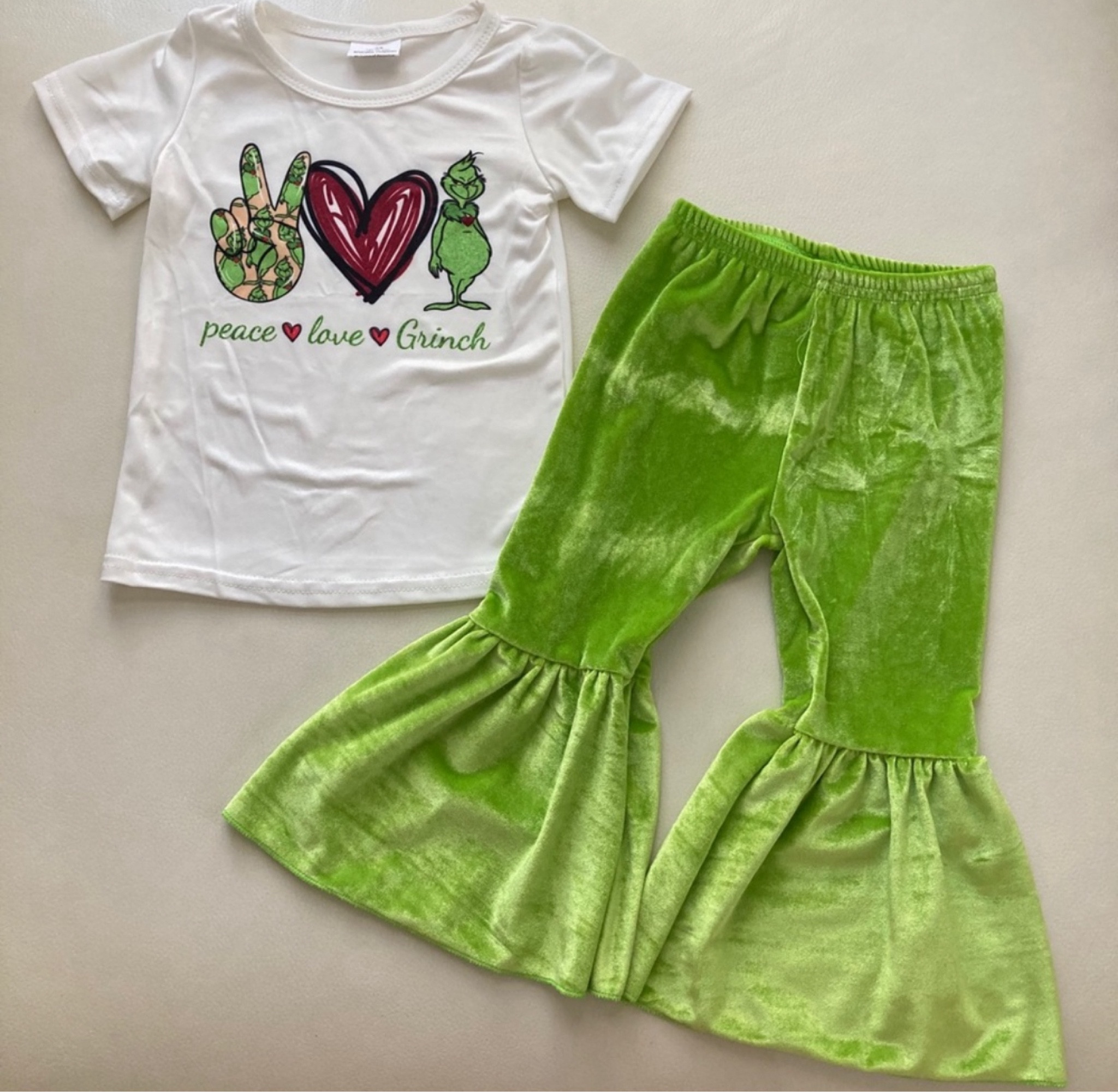Peace Love Grinch 

#LTKHoliday #LTKKids #LTKGiftGuide