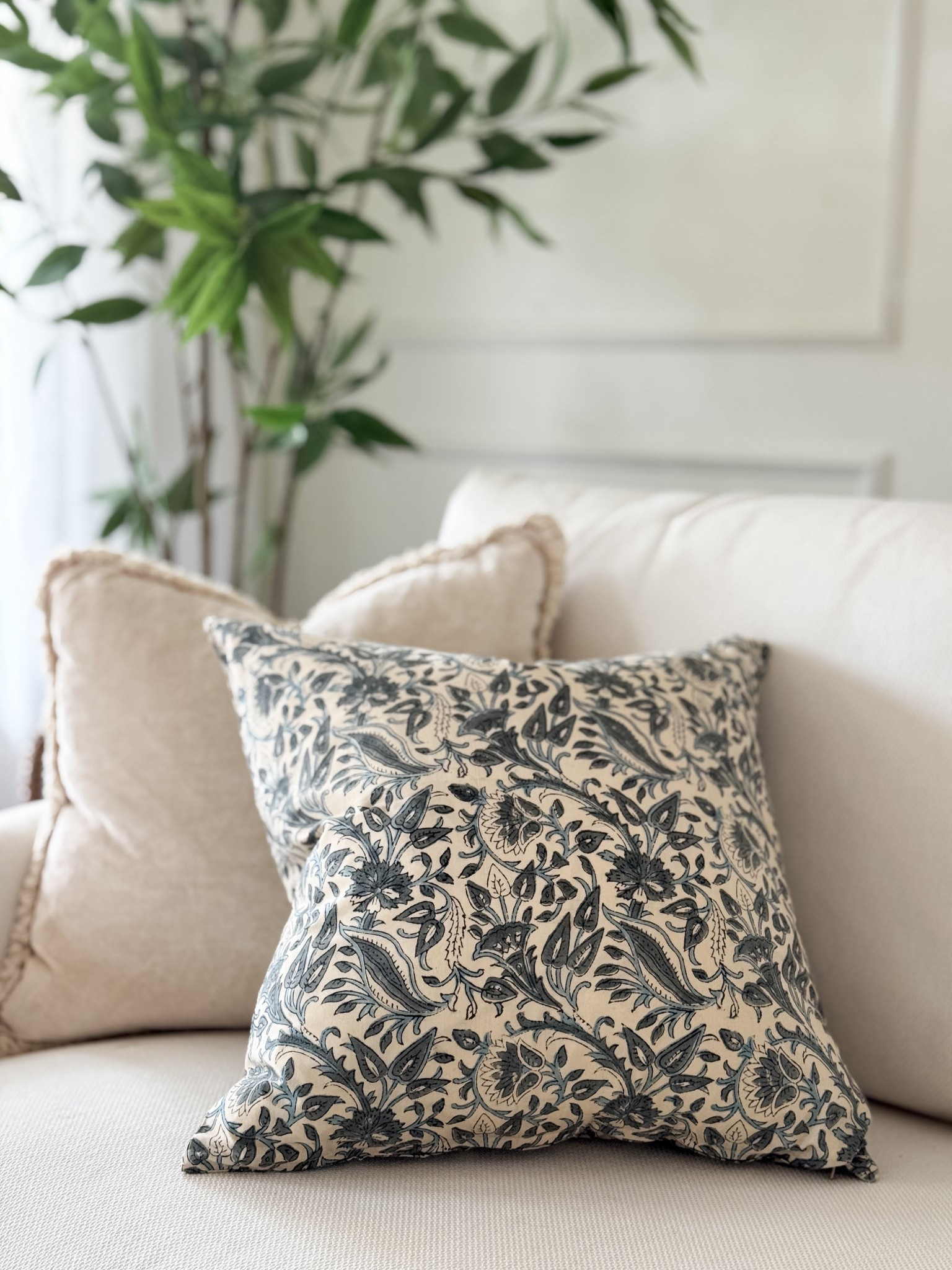 With its lovely mix of cream, green and blue, I'm loving the fresh look this floral pillow cover adds to our living room for spring! #springdecor #livingroomdecor #springpillow #floralpillow

#LTKdayinmylife #LTKSeasonal #LTKHome