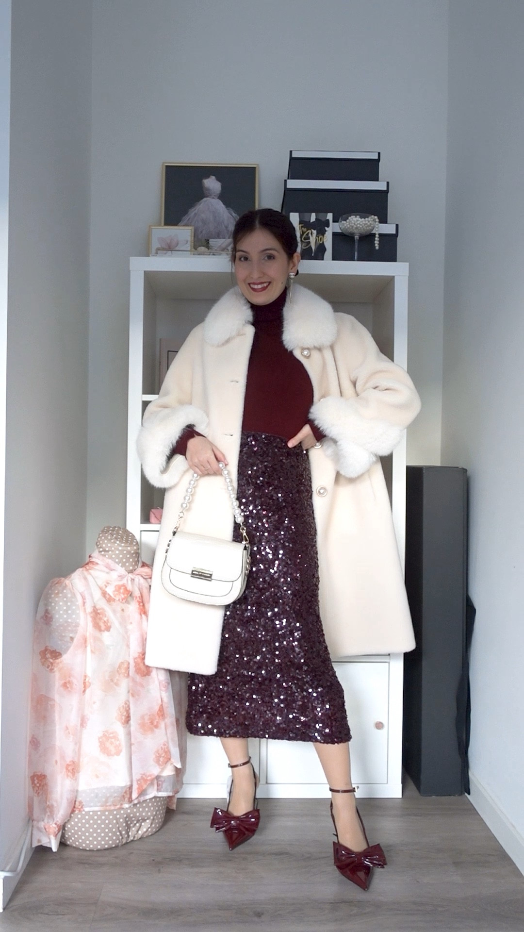 Day 5 of 25 days of festive outfits!

I recently got this skirt from Mango and it’s so perfect! The colour is amazing and it shines beautifully. It’s also so elegant that I had to create a look with it that I would wear to a fancy restaurant. 
At the time I filmed this outfit I didn’t have my new burgundy faux fur. Actually this look was the reason I went on Vinted to search for one! Ideally I would love to combine it with a burgundy Santinni coat I’m eyeing at the moment. But my bank account gave me a side eye 😒😂

Outfit details:
Coat: Santinni
Top and shoes: Zara (shoe code 2241/410)
Skirt: Mango
Bag: Ideal of Sweden
Ring: Swarovski
Earrings: Chanel
Hair bow: H&M


#LTKpartywear #LTKeurope #LTKshoes