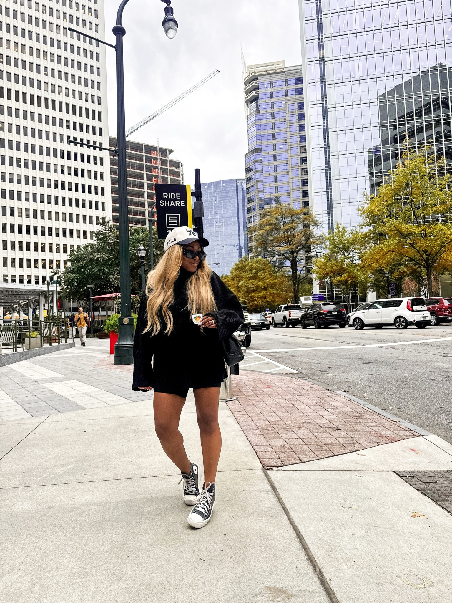 Oversize black sweater paired with biker shorts and platform converses 

#LTKfindsunder100 #LTKstyletip #LTKSeasonal