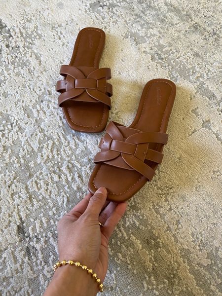 Sandals on sale for $16. Designer look for less. Faux leather flat slide sandals that are comfortable and true to size. Comes also  in black and other colors  

#LTKover40 #LTKfindsunder50 #LTKsalealert