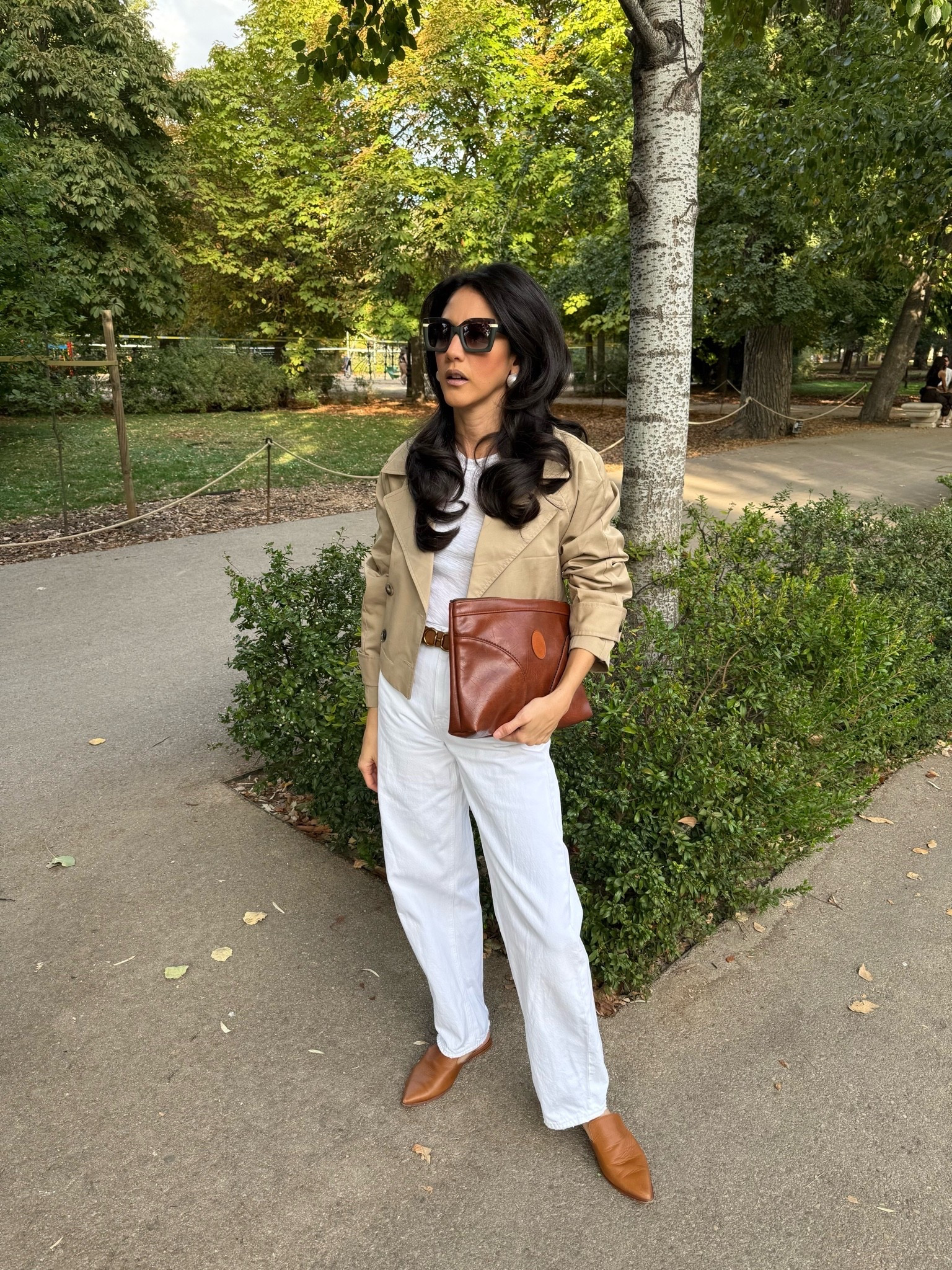 Styling tip and outfit idea for fall: white cropped jersey, white legged jeans, cropped trench coat, brown belt, brown mules, brown clutch, and out the door in the lightest fall pieces given that it’s still warm in Madrid although it seems the weather may be finally cooling down this weekend!

#LTKootd #LTKTravel #LTKWorkwear