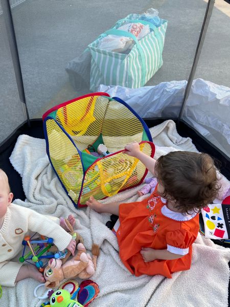 Linked similar toy hampers. California beach co pop up baby play pen! Seriously the best baby investment! We’ve taken to the beach, set up outside in the yard, tailgates, and now brought to trunk or treat. 

#LTKfamily #LTKkids #LTKbaby