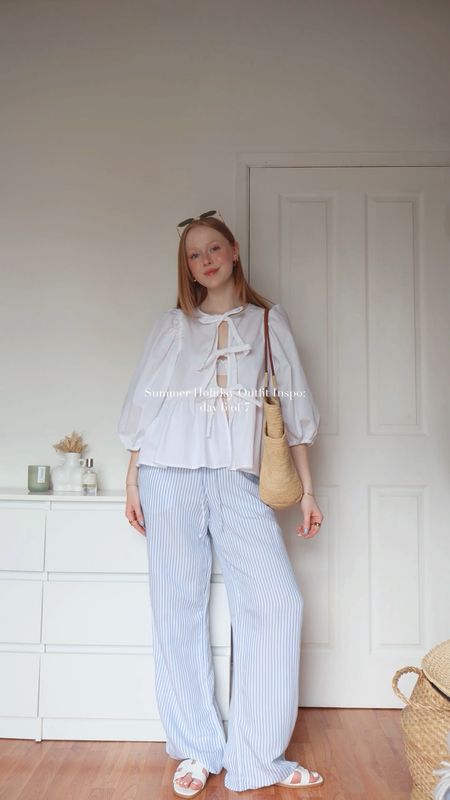 Summer Holiday Outfit Inspo  6/7 🩵

Ganni, Tie Detail Blouse, Tie Up Blouse, Puff Sleeve Blouse, Stripe Linen Trousers, Patterned Trousers, Flowy Trousers, Cotton Trousers, Basket Bag, Beach Bag, Tote Bag. 

#LTKeurope #LTKtravel #LTKsummer