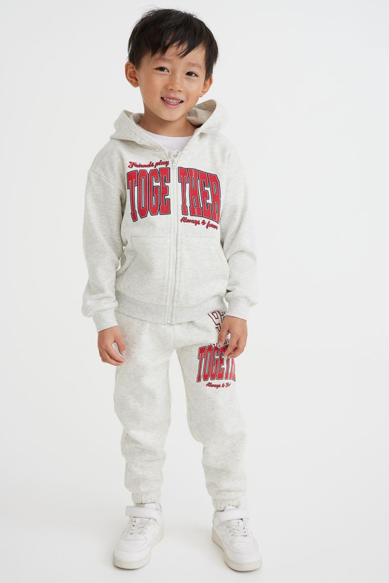 Printed Joggers - Light gray melange/Together - Kids | H&M US | H&M (US + CA)