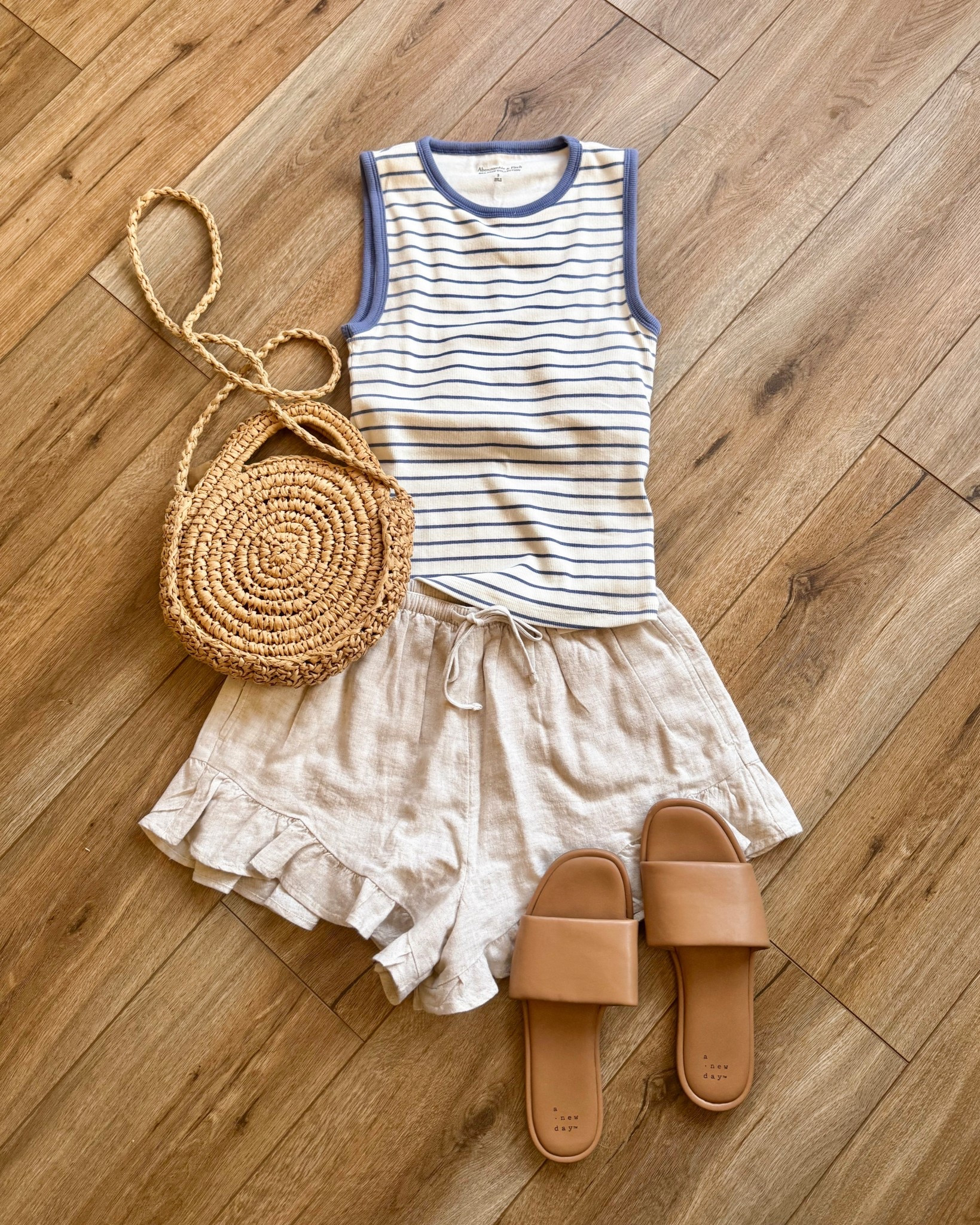 casual vacation outfits. linen shorts and tank top.
abercrombie. 

#LTKSeasonal #LTKSaleAlert #LTKootd