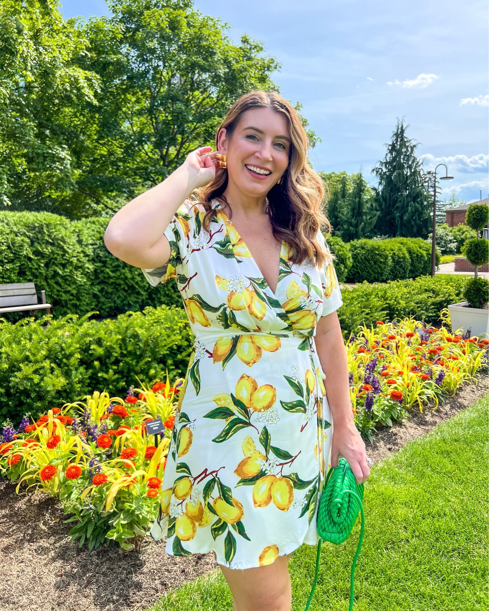 Lulus lemon short sleeve wrap dress, mini dress, summer dress, European vacation dress, date night dress, gold earrings, heels, green handbag 

#LTKItBag #LTKFindsUnder100 #LTKStyleTip