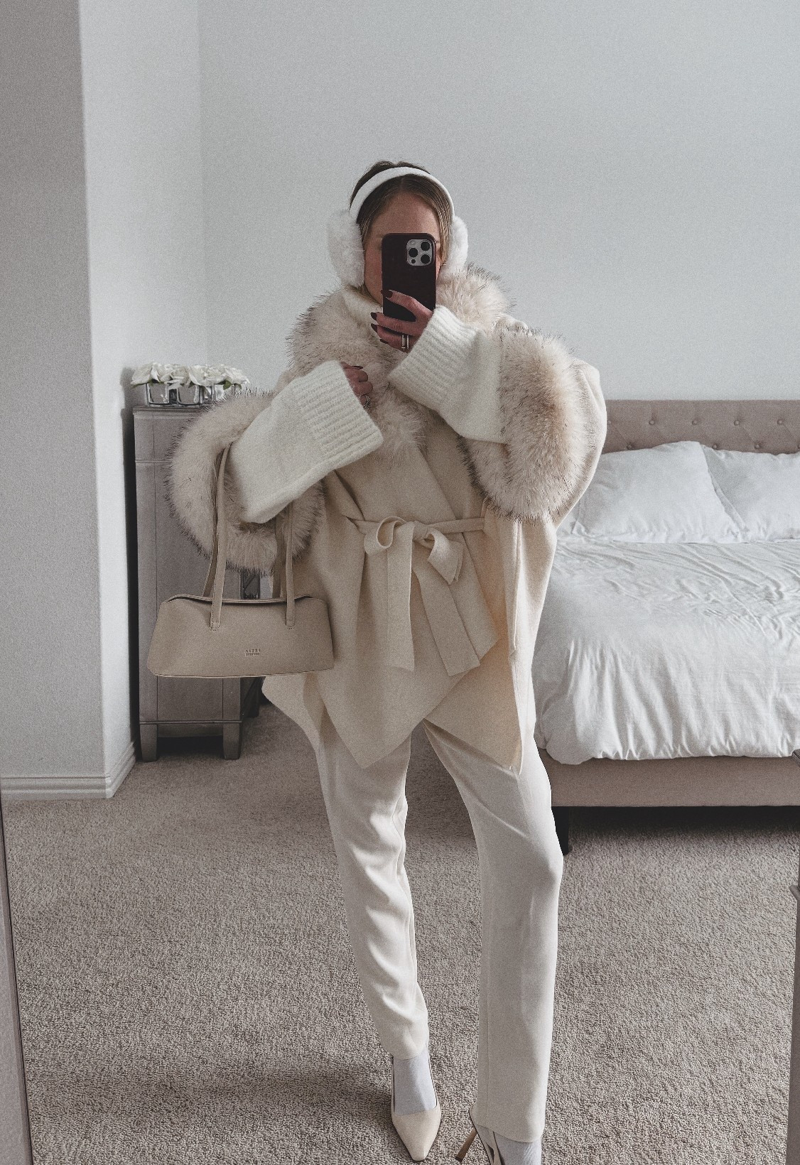 Chic neutral winter outfit featuring a faux fur cape, belted coat, cream trousers, and pointed toe heels.

Perfect cold weather look for winter errands, brunch, or travel days.

Elevated basics, classic neutrals, and timeless winter layers 🤍

#LTKSeasonal #LTKootd