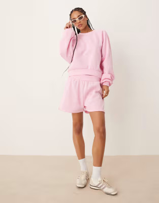 ASOS DESIGN - Co-ord set van sweatstof in roze | ASOS (Global)