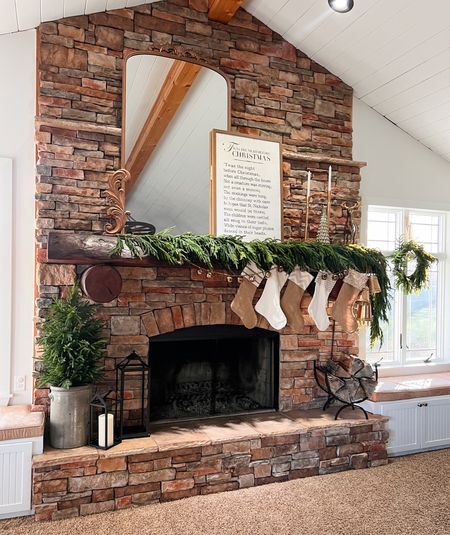 Holiday mantel decor. Holiday hearth decor. Norfolk pine garland. How to style Norfolk pine on your hearth. Christmas decor. Norfolk pine greenery. Farmhouse chic Christmas decor. 

#LTKHoliday #LTKSeasonal #LTKhome
