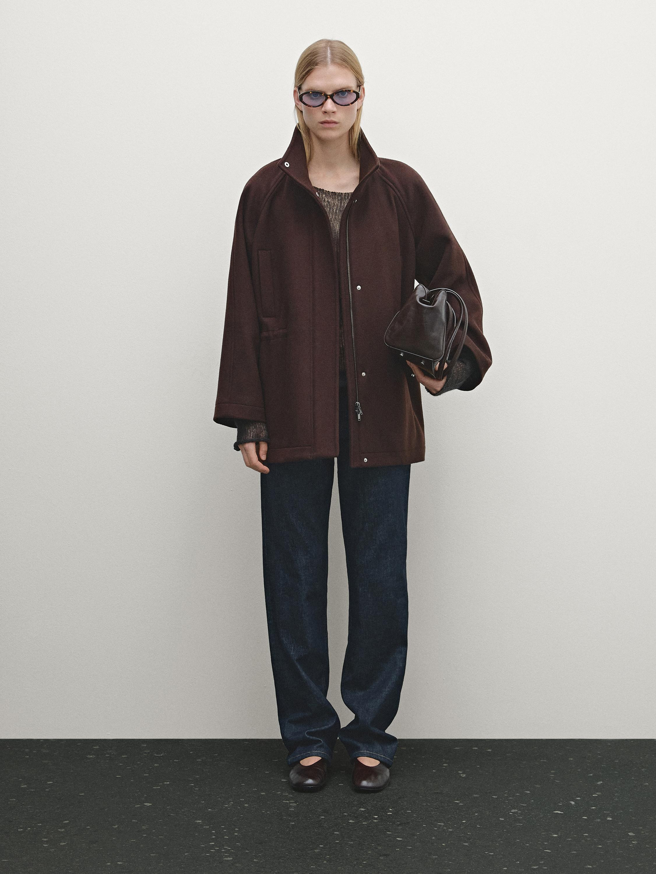 Jacket made of wool blend. High neck. Zip fastening concealed by a placket with snap buttons. Ela... | Massimo Dutti US