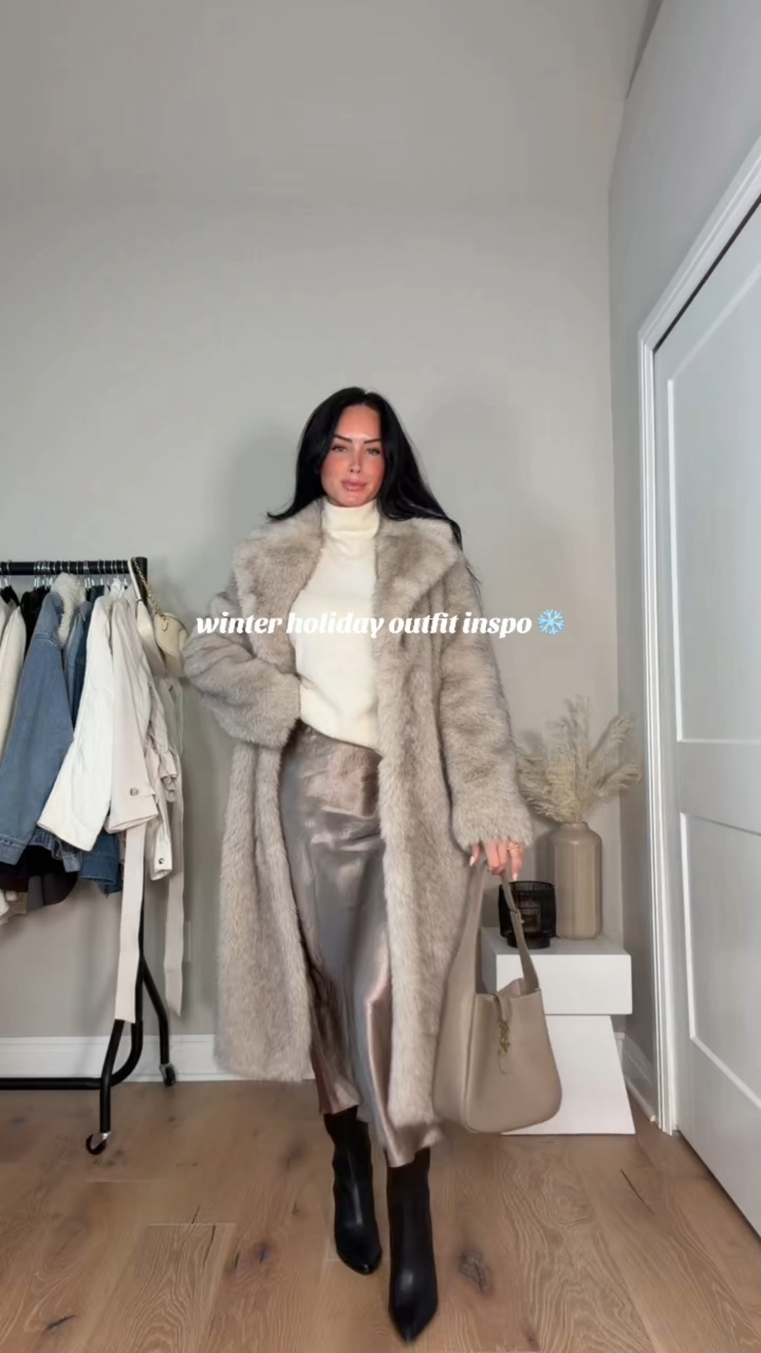 Neutral cold-weather holiday outfit inspo ❄️🤍 I will have my outfit 🔗 on my LTK in the outfit Inspo section. 

I styled this pretty and cozy look with all Aritzia pieces a satin skirt, turtleneck tank, and a long faux-fur jacket for that soft, elevated winter vibe. Paired it with tall black boots to keep it chic but still warm. Perfect for holiday dinners, photos, or any festive night out!

My sizing 5’7, 145lbs, 32dd
I’m wearing size smalls, size 6 skirt 

#LTKHoliday #LTKootd #LTKgrwm