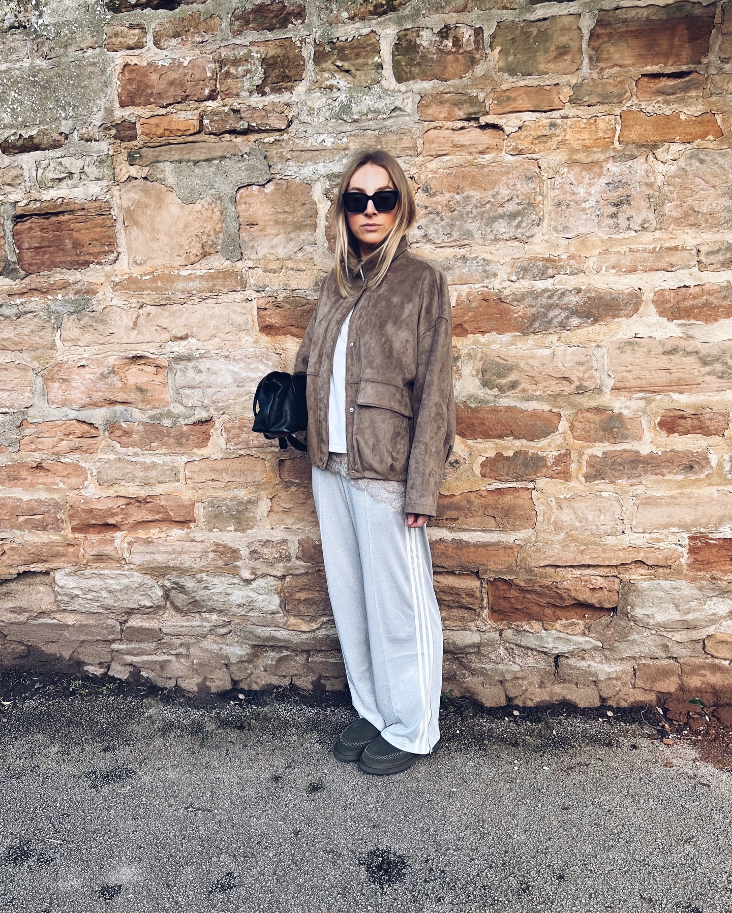 January blues temporarily cured yesterday by 10 minutes of sunshine, @emuaustralia sharky scuffs and the best chilli crab linguine 🫶🏼 

(And maybe a little bit of delusion)
 
*Sharky Adventure Scuff pr 

#bemoreEMU #EMUaustralia #EMUse 

(Lace trim layering, lace trim cami, adidas track pants, adidas firebird, suede bomber jacket, lace trim styling, winter outfit, chic winter outfit, adidas firebird outfits, minimal outfit ideas, funnel neck jacket, howtowear track pants, winter style ideas, hair tuck, sheepskin clogs)