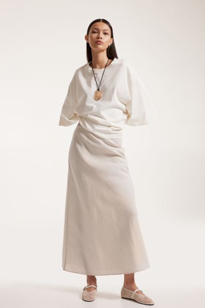Maxifalda de satén | H&M (FR, IT, ES, PT, BE)