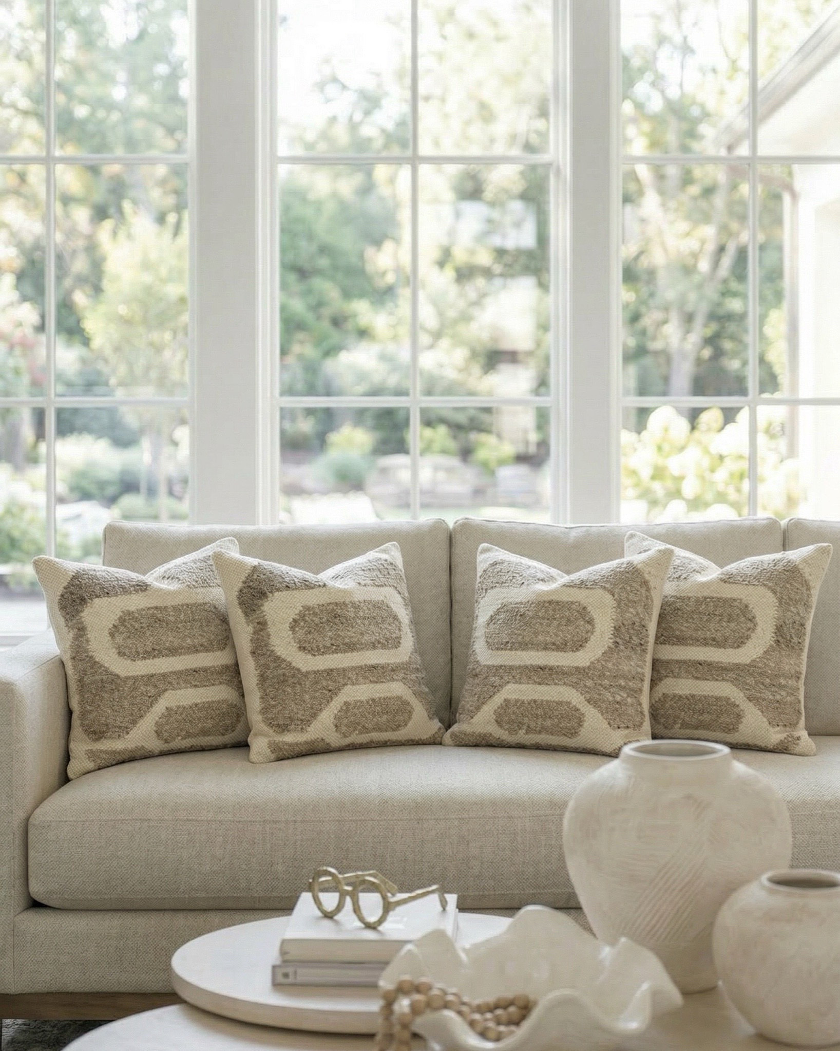 Shop the look:
• Cream upholstered sofa / neutral fabric couch • Ivory boucle accent chairs • Round light wood coffee table • Textured boucle ottomans / foot stools • Vintage distressed area rug (neutral patterned rug) • Marble slab fireplace wall / stone fireplace design • Custom built-in shelving / wood built-ins • Decorative vases (ceramic + sculptural decor) • Coffee table books + tray styling decor • Wood console table (rustic entryway table) • Upholstered bench / small stool • Brass table lamp with patterned shade • Glass + brass side table • Framed abstract wall art (neutral artwork) • Wall sconces with globe lighting • Olive branch stems / faux greenery • Woven throw blanket / textured throw • Decorative beads / bowl accents

#LTKhome #LTKsale #LTKstyletip