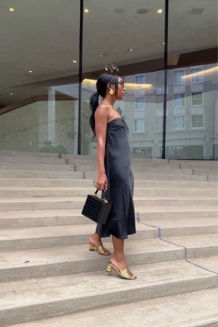 Black strapless dress on major sale under $40, seashell earrings, black handbag, gold heels 

#LTKshoecrush #LTKstyletip #LTKsalealert