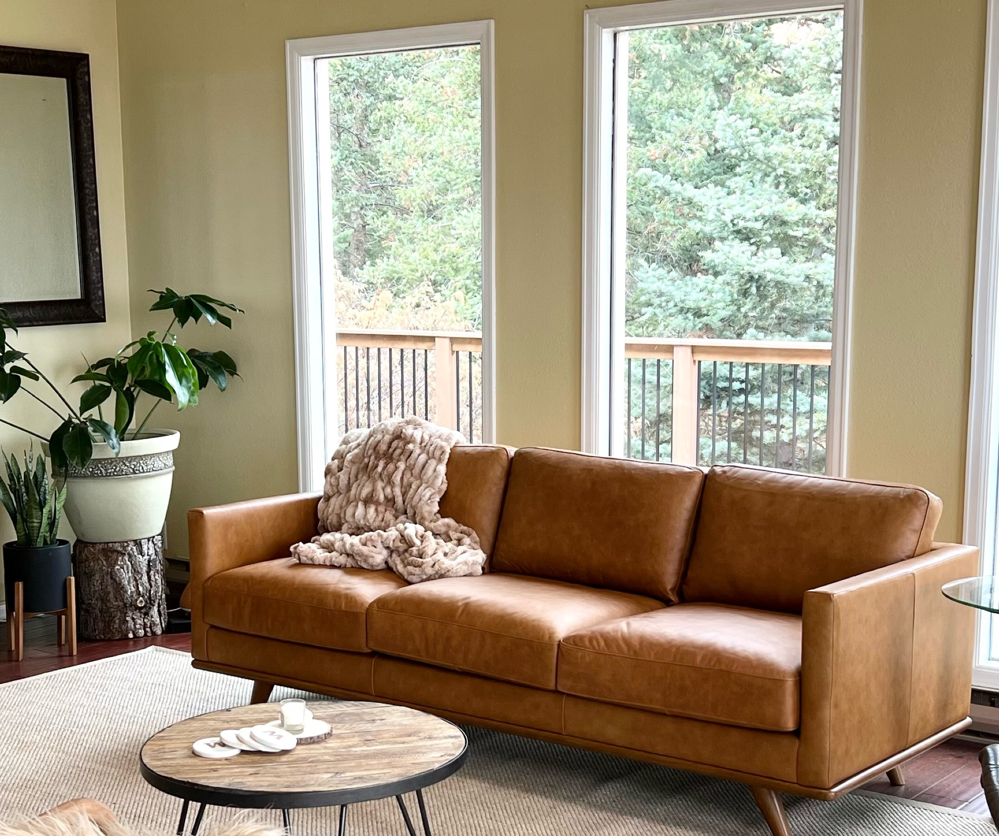 Leather sofa. Modern leather sofa. This looks and feels like it cost much more than it does. 10 out of 10 for comfort! Great for kids and pets too. 

#LTKfamily #LTKhome #LTKsalealert