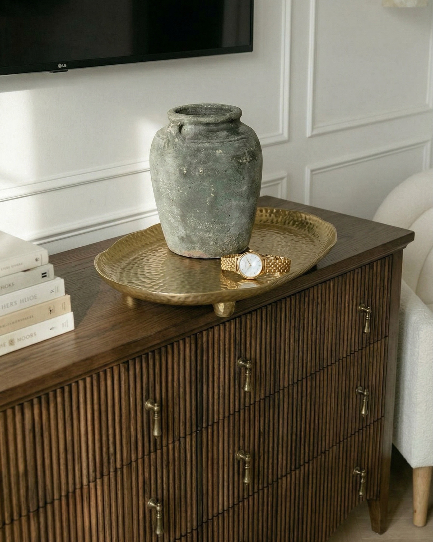 Shop the look:
* Upholstered bed cream textured fabric
* Channel tufted bed neutral
* Boucle bench ivory curved modern
* Ribbed wood nightstands dark walnut
* Curved wood dresser fluted front
* Modern vintage dresser brass hardware
* Boucle accent chair cream wood legs
* Brass chandelier modern candle style
* Gold minimalist chandelier linear arms
* Brass wall sconces stone shade
* Alabaster wall sconces gold
* Ceramic table lamp cream base white shade
* Moody floral wall art large canvas
* Gold scalloped wall mirrors
* Decorative ceramic vase large neutral
* Greenery stems in ceramic vase
* Black and brown patterned throw pillow
* Stacked neutral coffee table books
* Decorative stone bowl tray
* White duvet cover luxury hotel style
* Chunky knit throw blanket brown
* Neutral throw blanket layered bedding
* White pillows minimal bedding
* Textured cream bed upholstery
* Brown cream geometric area rug
* Diamond pattern rug neutral tones
* Vintage inspired rug brown beige
* Neutral bedroom ideas
* Beige and brown bedroom decor
* Luxury neutral bedroom
* Organic modern home decor
* Cozy minimalist bedroom
* Designer inspired bedroom
* Timeless bedroom design

#LTKhome #LTKsale #LTKstyletip