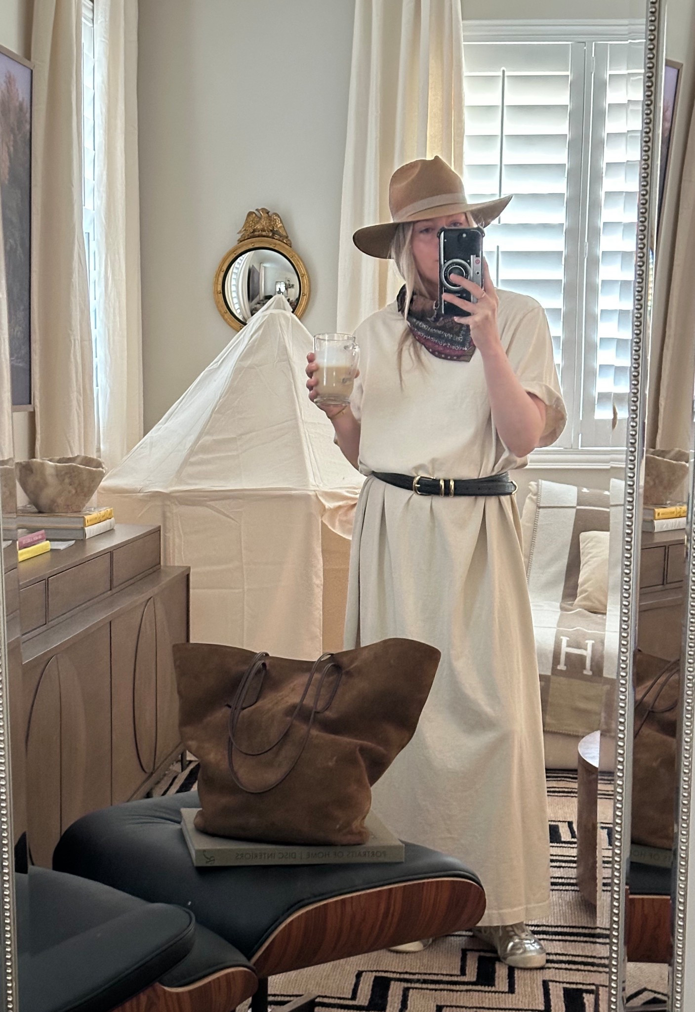 We are making lemon drops out of lemons from this dress H&M sent 3x my size in error. Pairing with my favorite daughter belt, Janessa Leone hat and silver sneakers