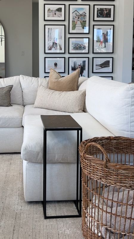 Living room refresh with new pieces from Arhaus including a boucle lumbar pillow, oversized basket to hold throw blankets, frame, marble tray and more. Also linking our white sectional sofa, round coffee table and area rug. 

#LTKstyletip #LTKhome