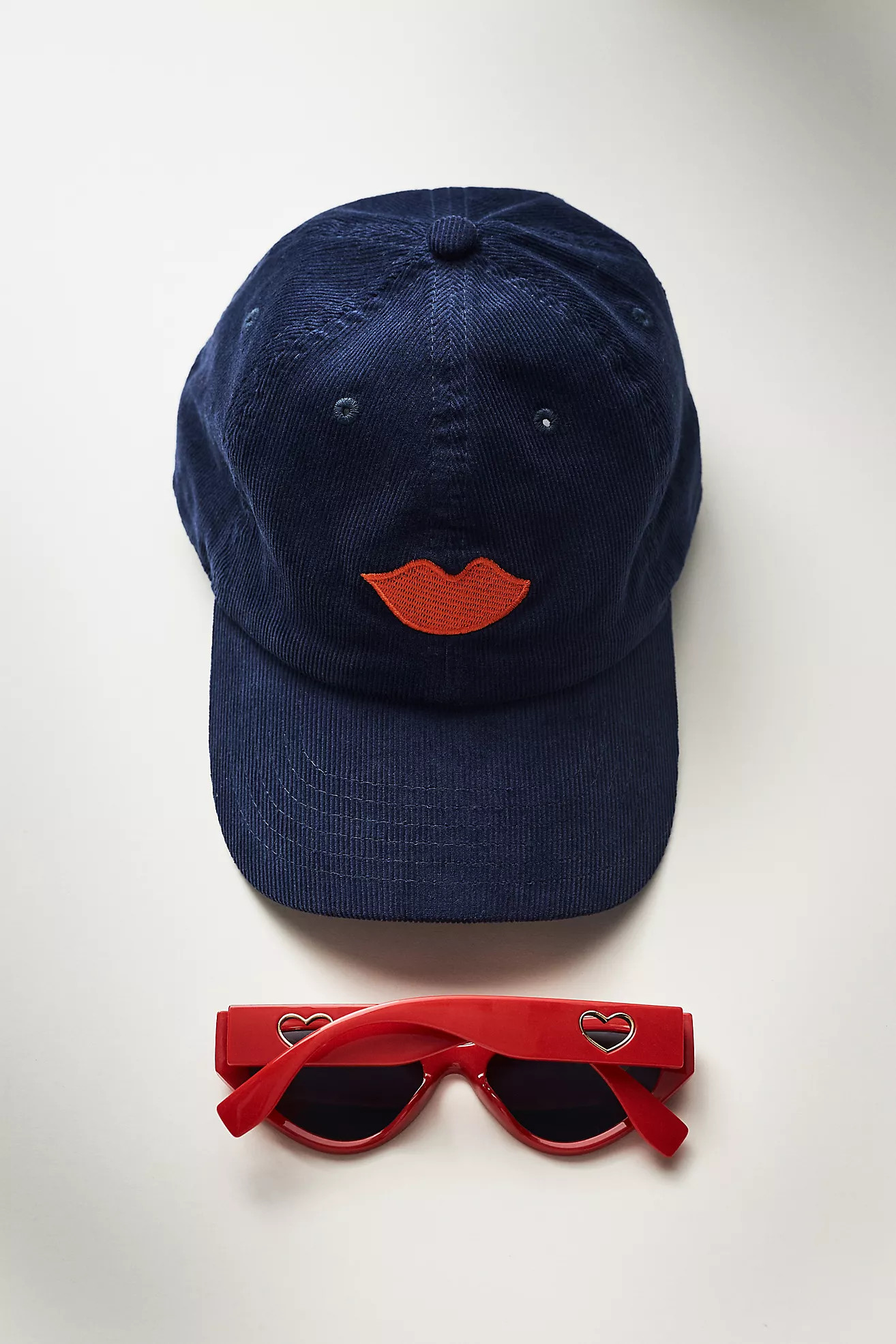 Clare V. Corduroy Lips Baseball CapClare V.Write a Review Reviews$70.00Color: NAVYFitStandardSize... | Anthropologie (US)