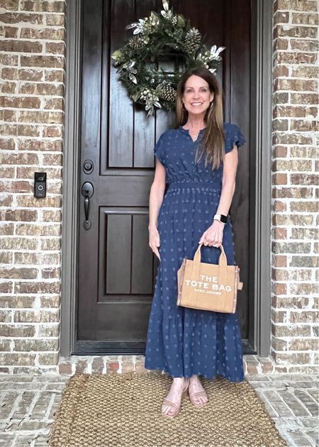 I’m loving this navy midi-length dress! The swiss dot fabric is a cute tone-on-tone pattern that gives it a nice texture. It fits perfectly for my 5’2” height. It also has an elastic-type waistband that stays in place and cinches in the waistline. It comes in tons of color options that are great for spring and summer. Wear it everywhere, from lunch to shopping to showers and more. Fits tts and I wear a small. #springfashion #petitelook #midlifeblogger #vacationoutfit

#LTKstyletip #LTKitbag #LTKSeasonal