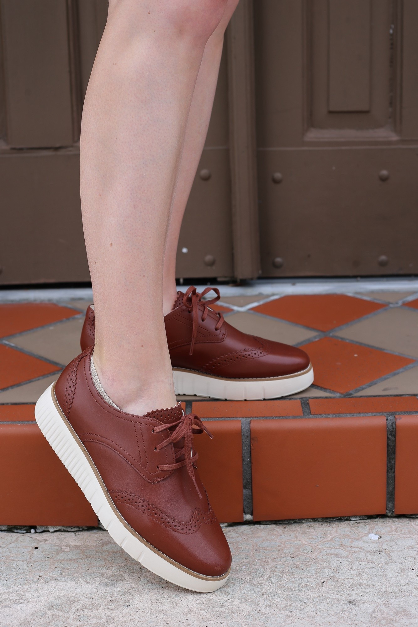 Brown Oxford platform sneakers with scallop details. Perfect for your European travels this summer  

#LTKShoeCrush